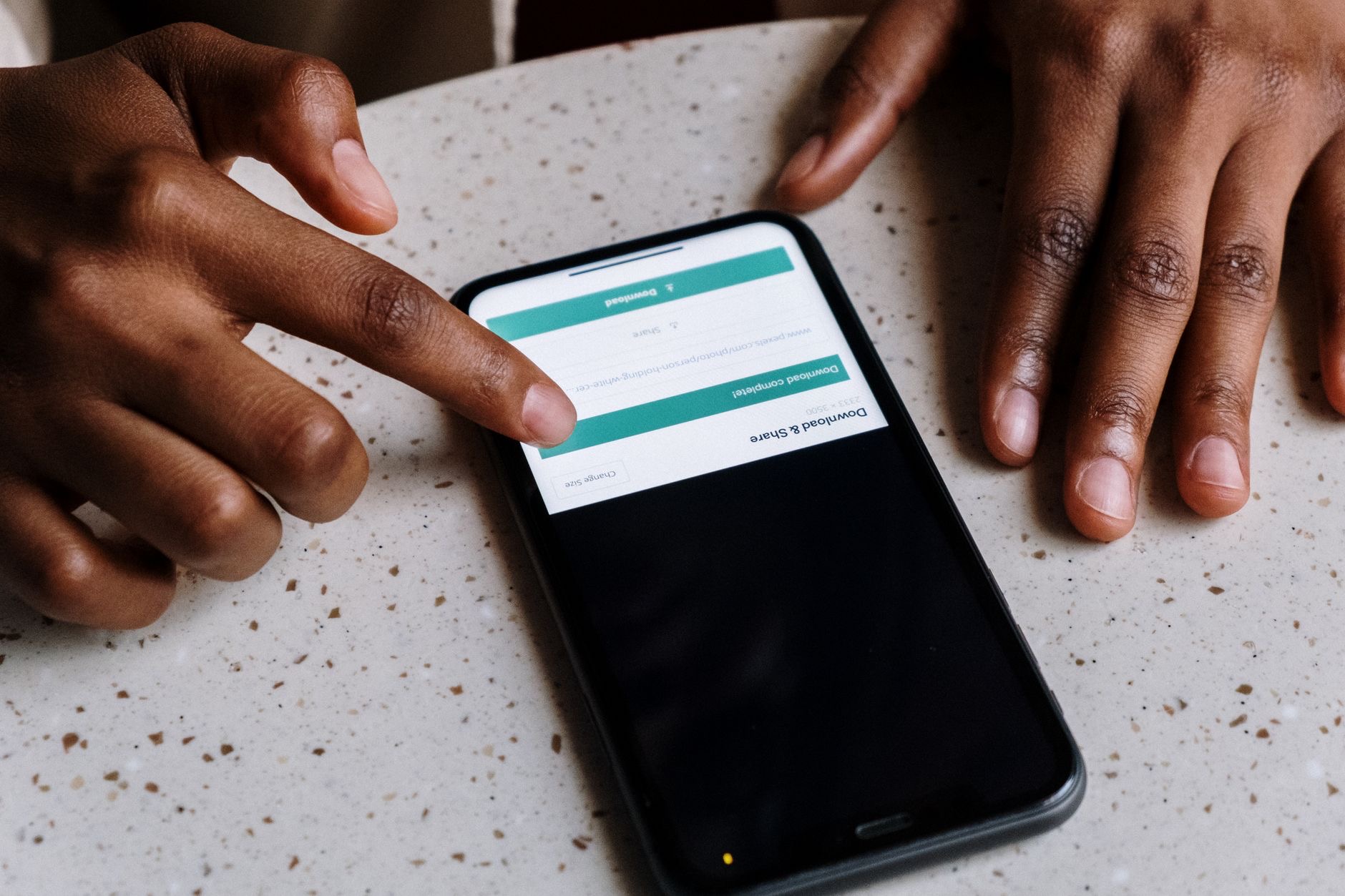 Person downloading apps on a phone