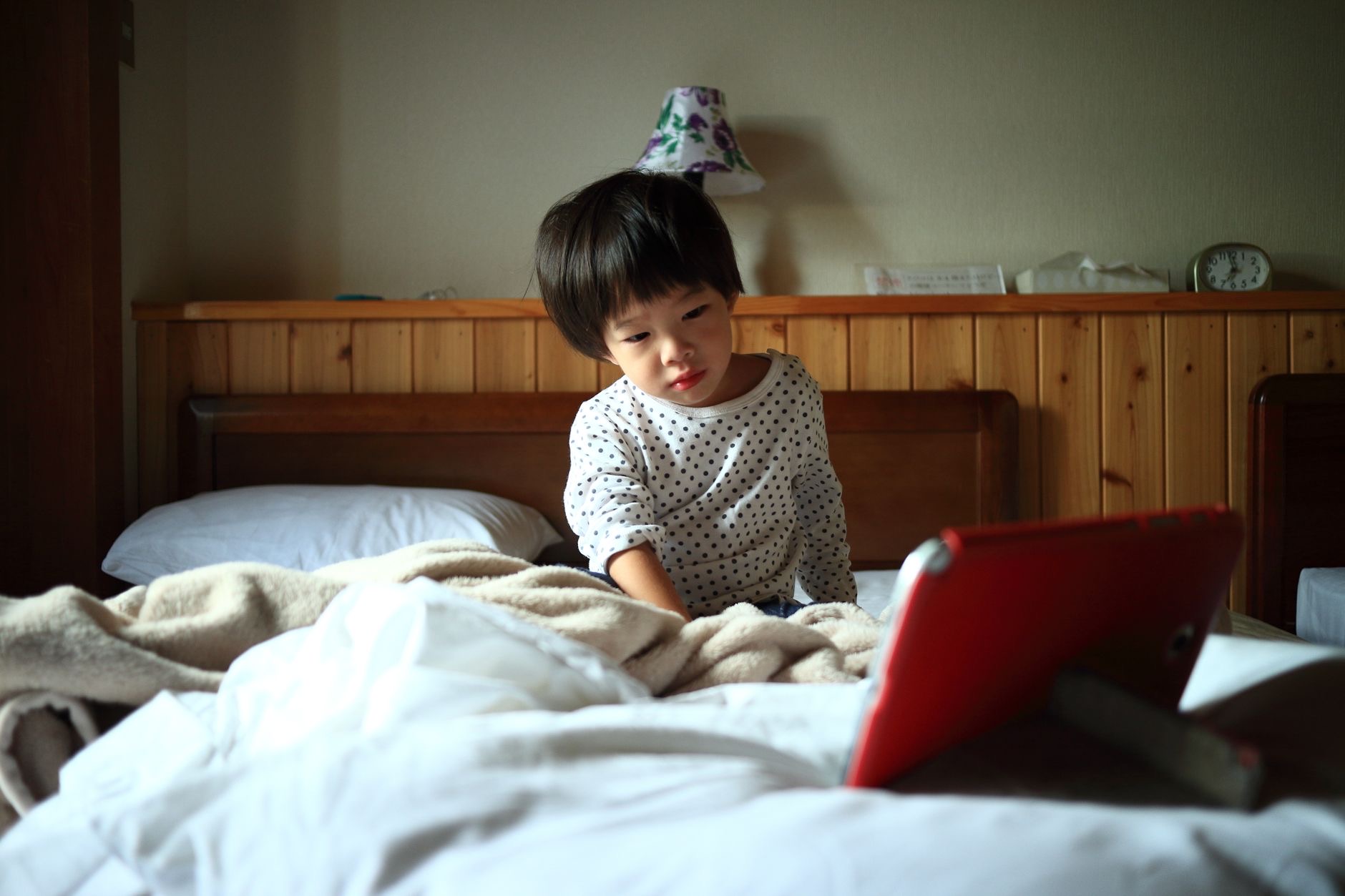 Child using a tablet at home