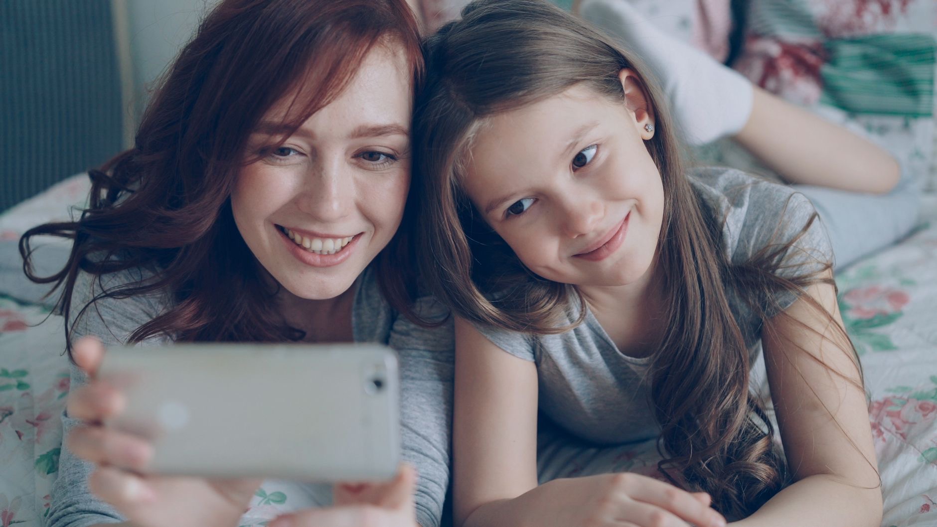 Parent setting up controls on a phone
