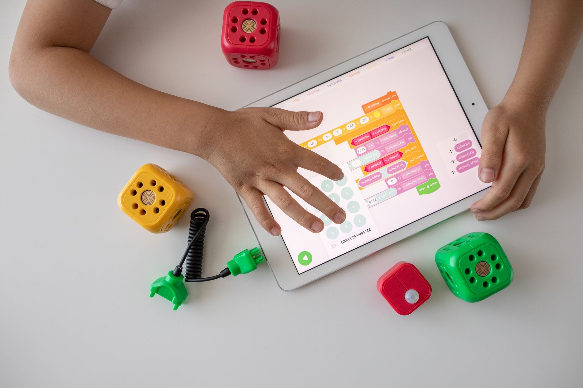Person playing a game on a tablet