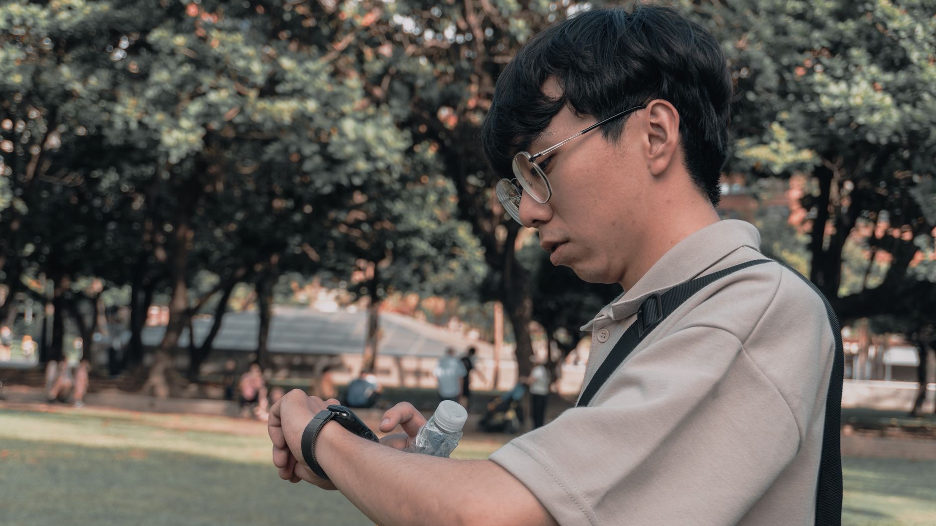 A person checking a smartwatch on their wrist