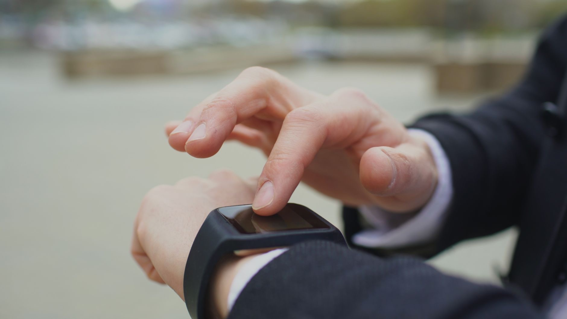 A close-up of a smartwatch on a wrist