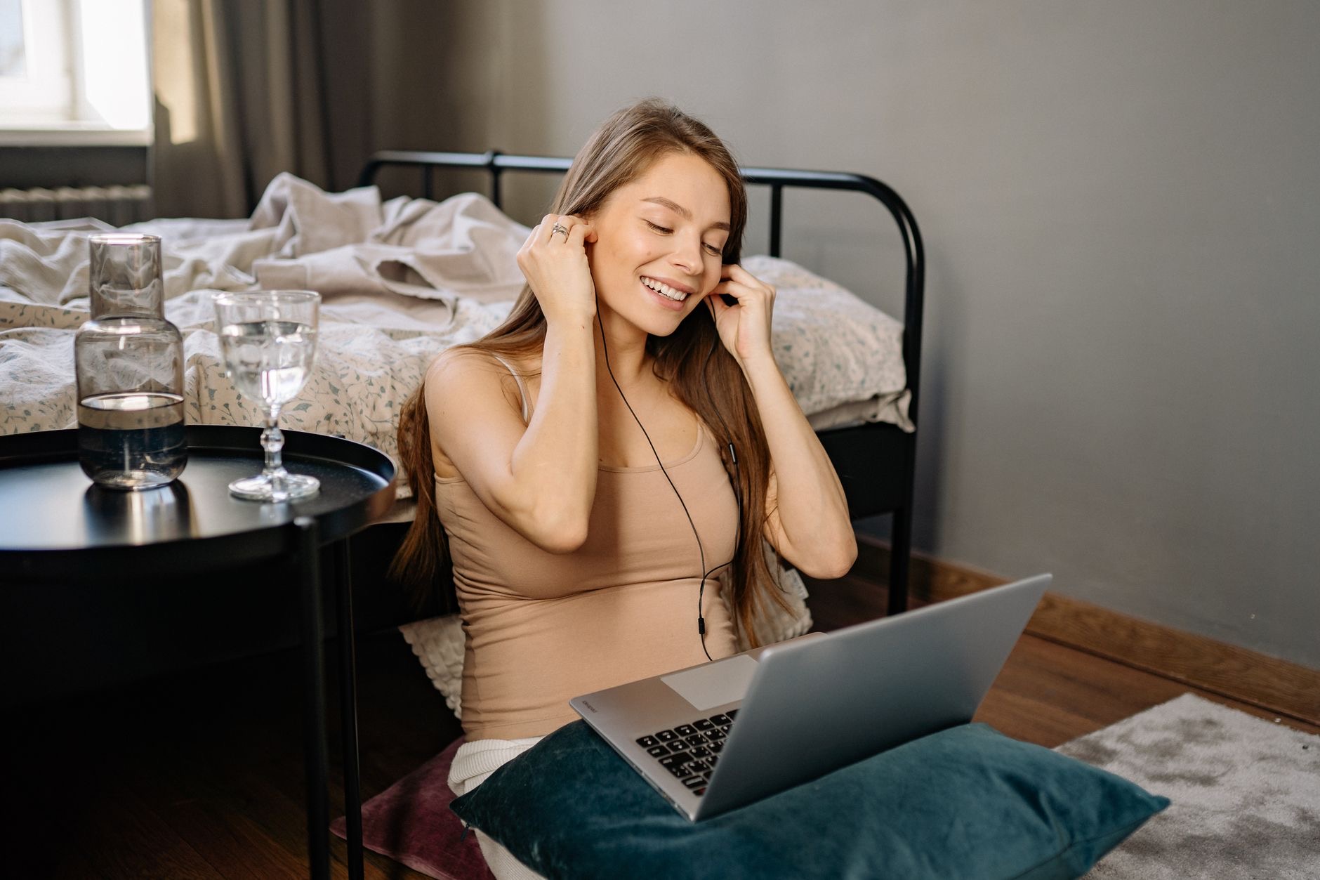 Wireless earbuds on a nightstand
