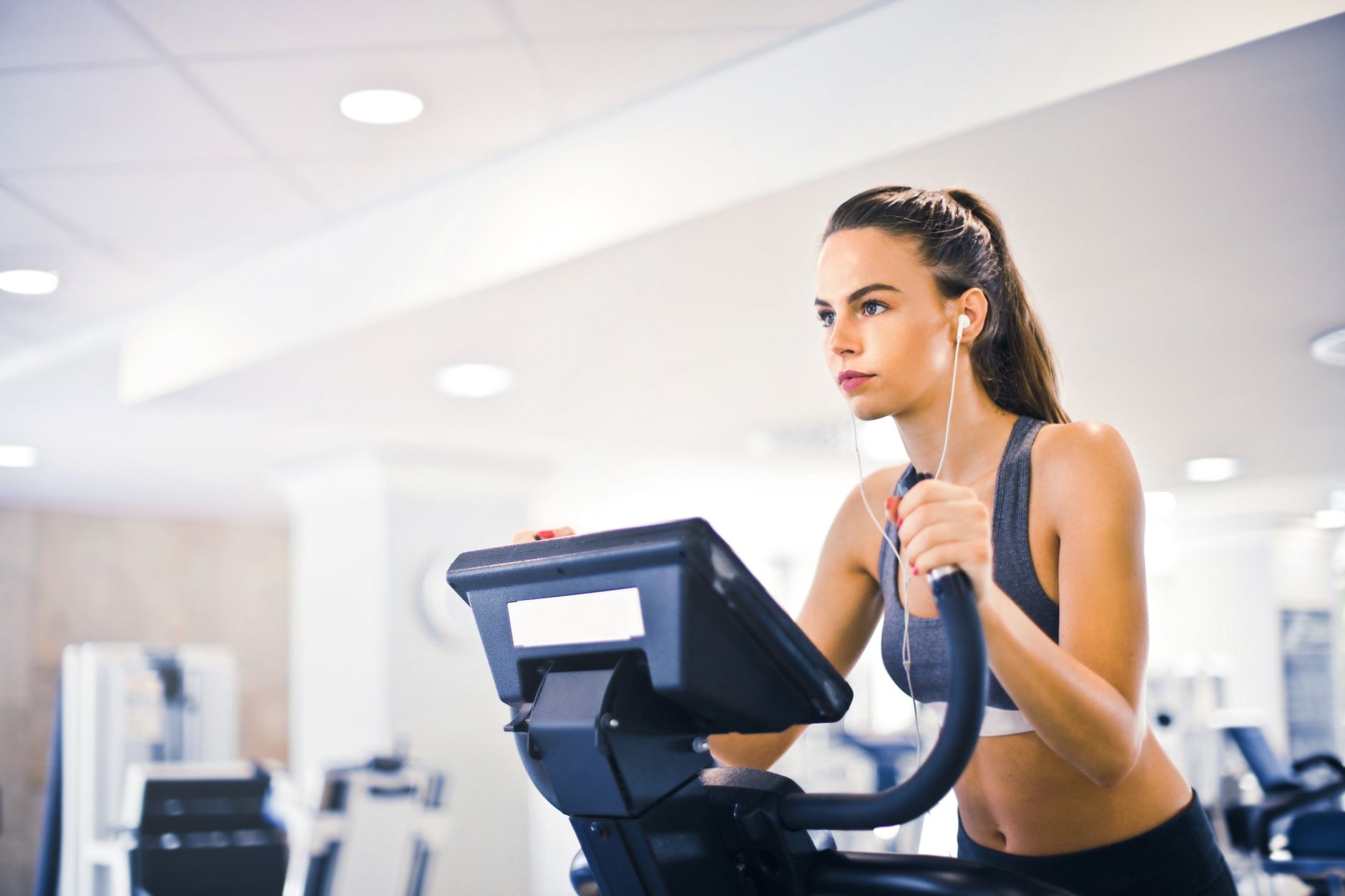 Person exercising while wearing earphones