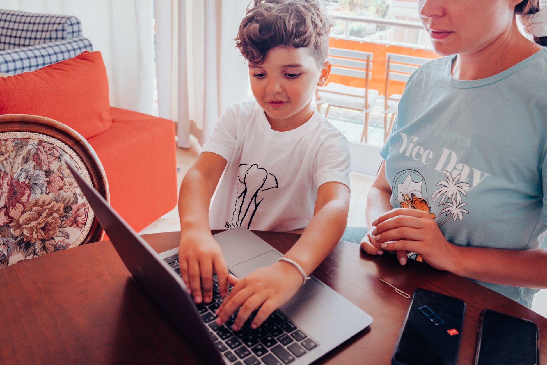 A child using technology outdoors