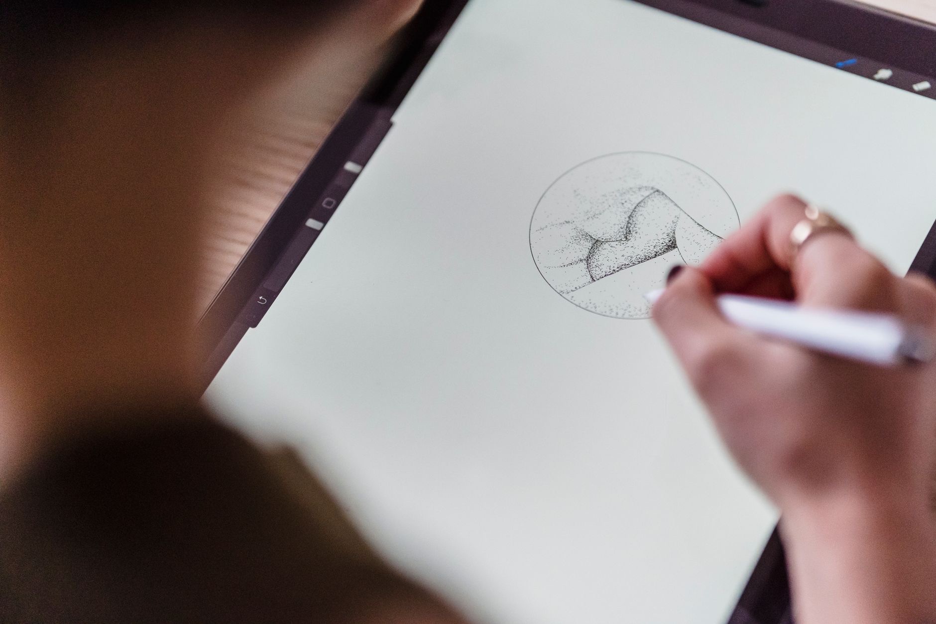 A digital illustration on a tablet screen
