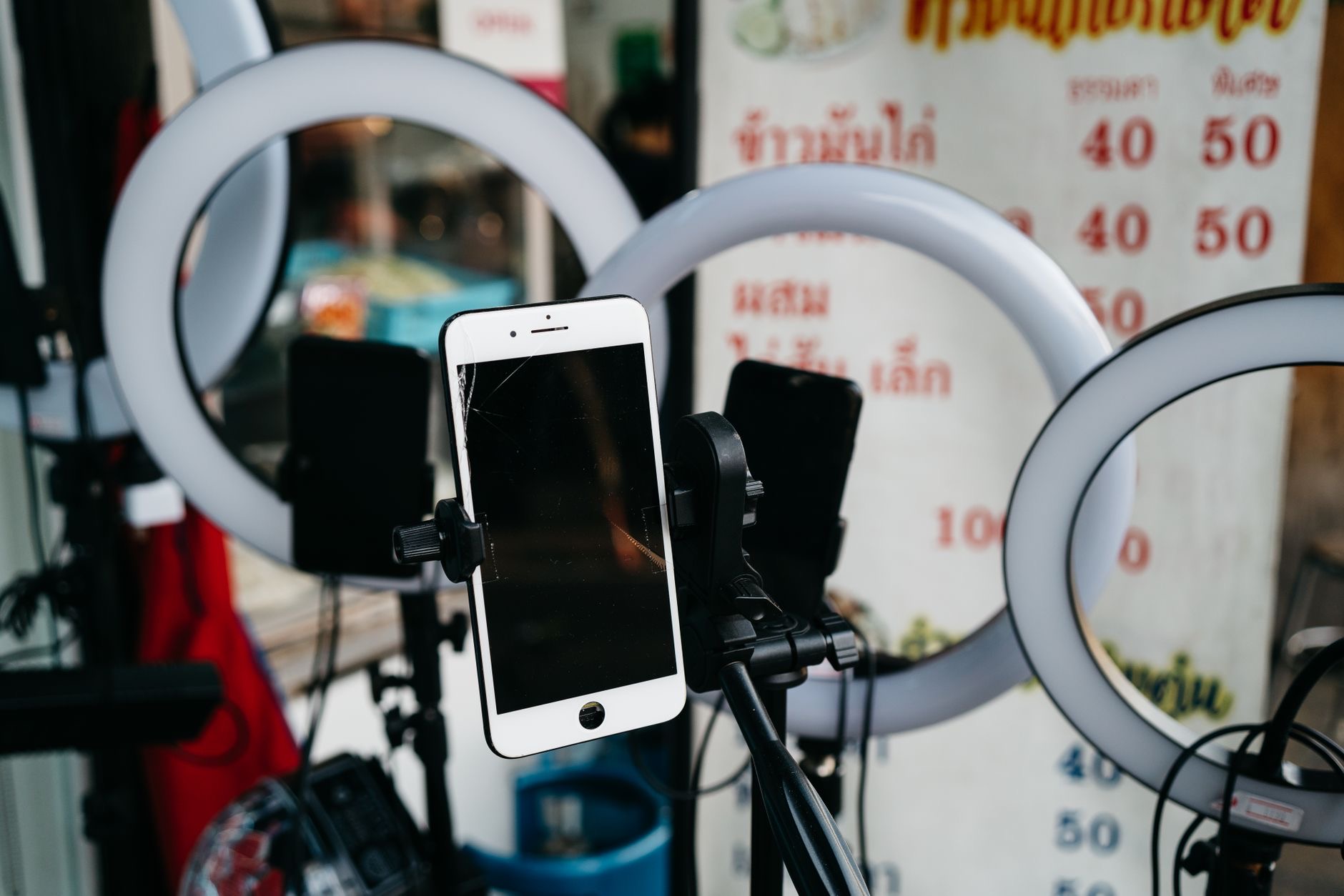 Ring light setup for phone photography in a studio environment