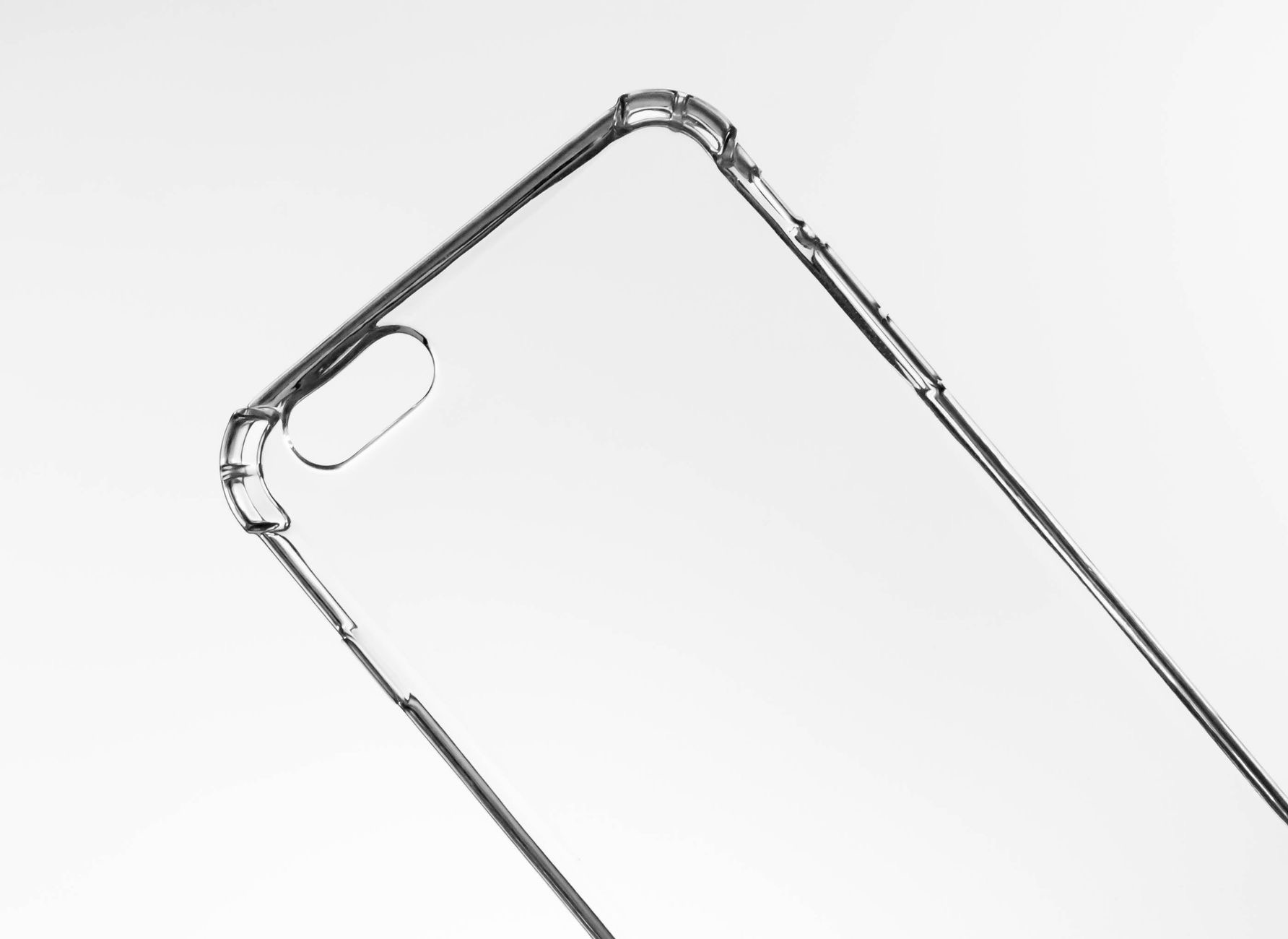 Clear iPhone case showing the phone design on a desk
