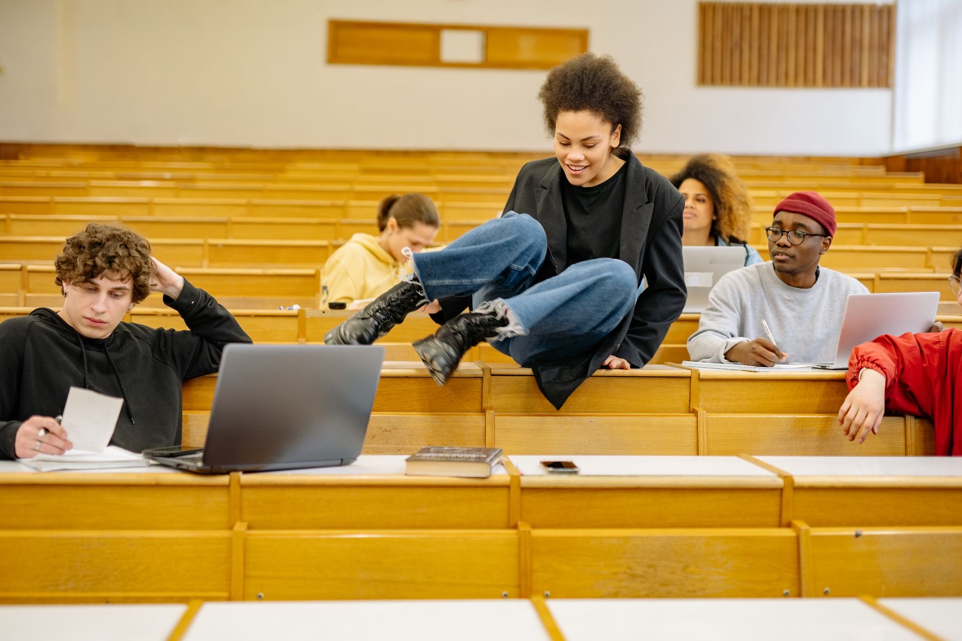 A student using a laptop on campus