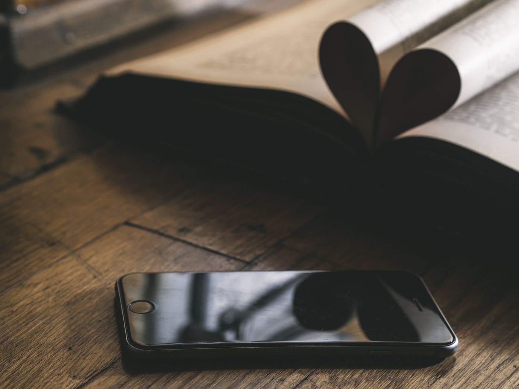 A used iPhone on a table for a buying checklist