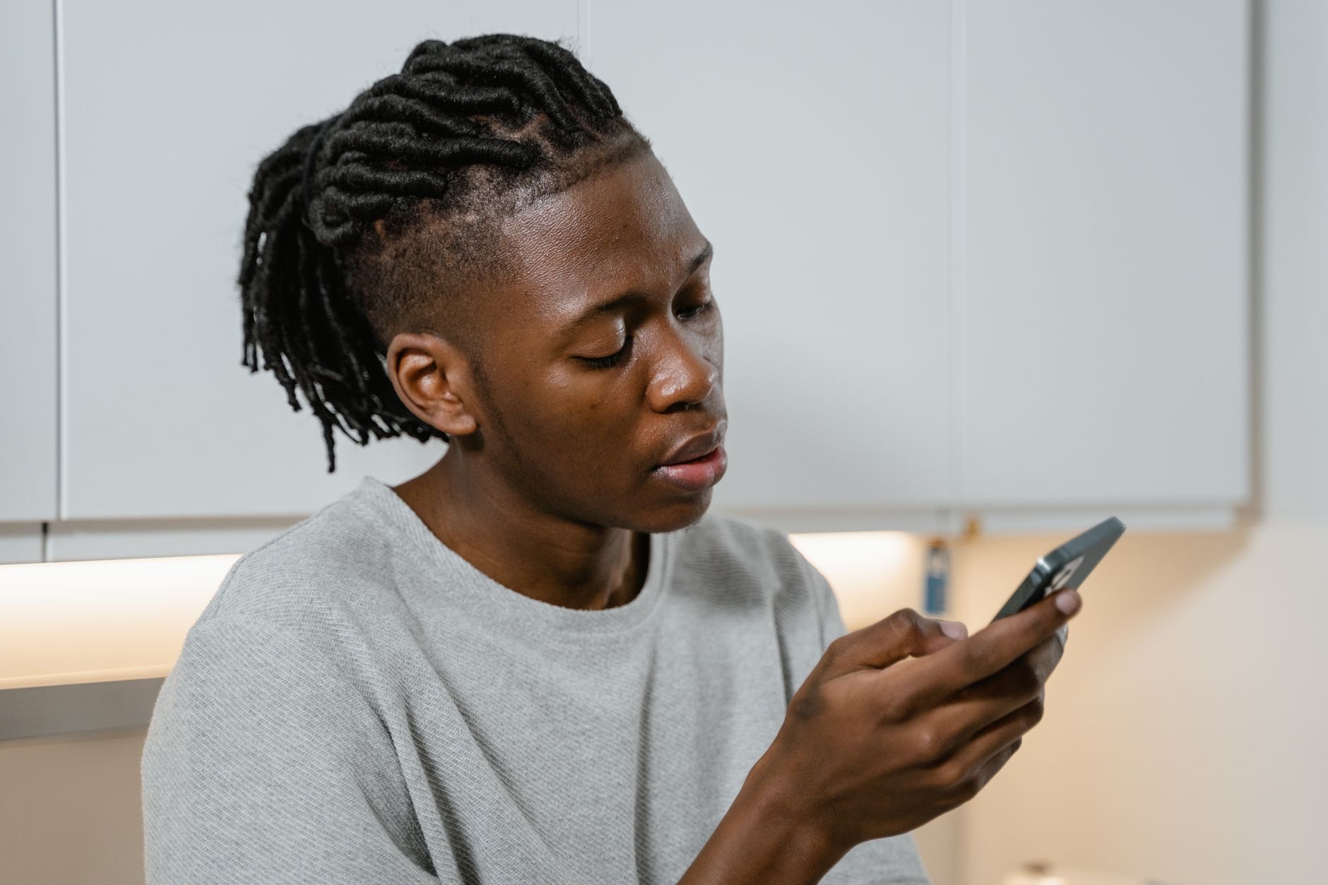 A person checking settings on a phone