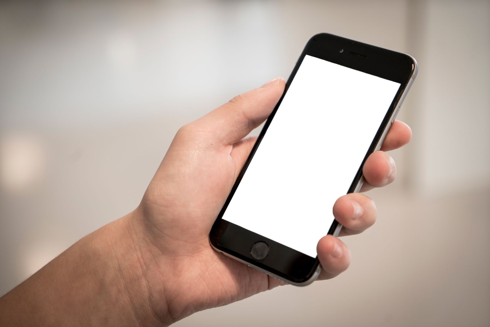 A smartphone held in a hand