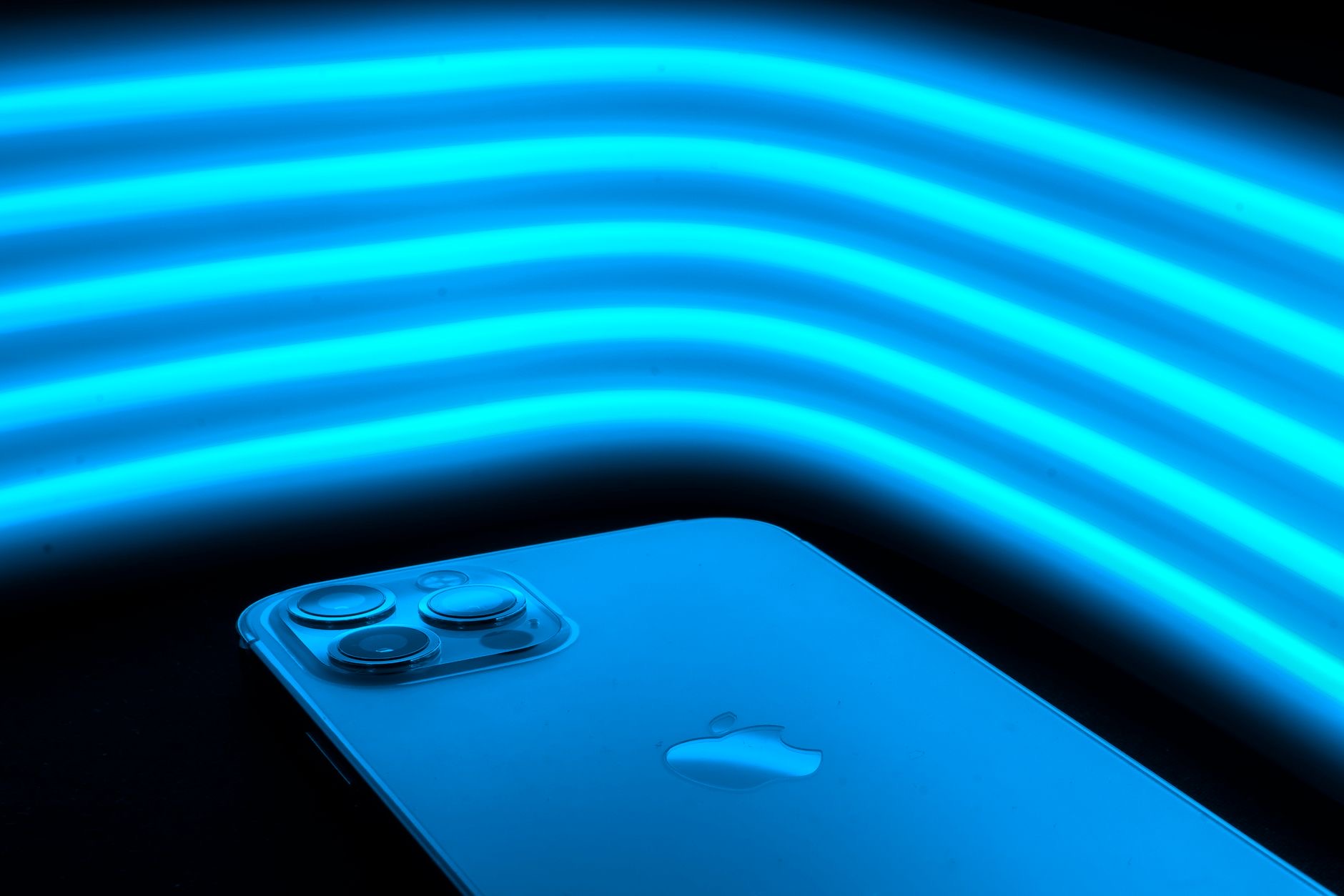 Several iPhones lined up together
