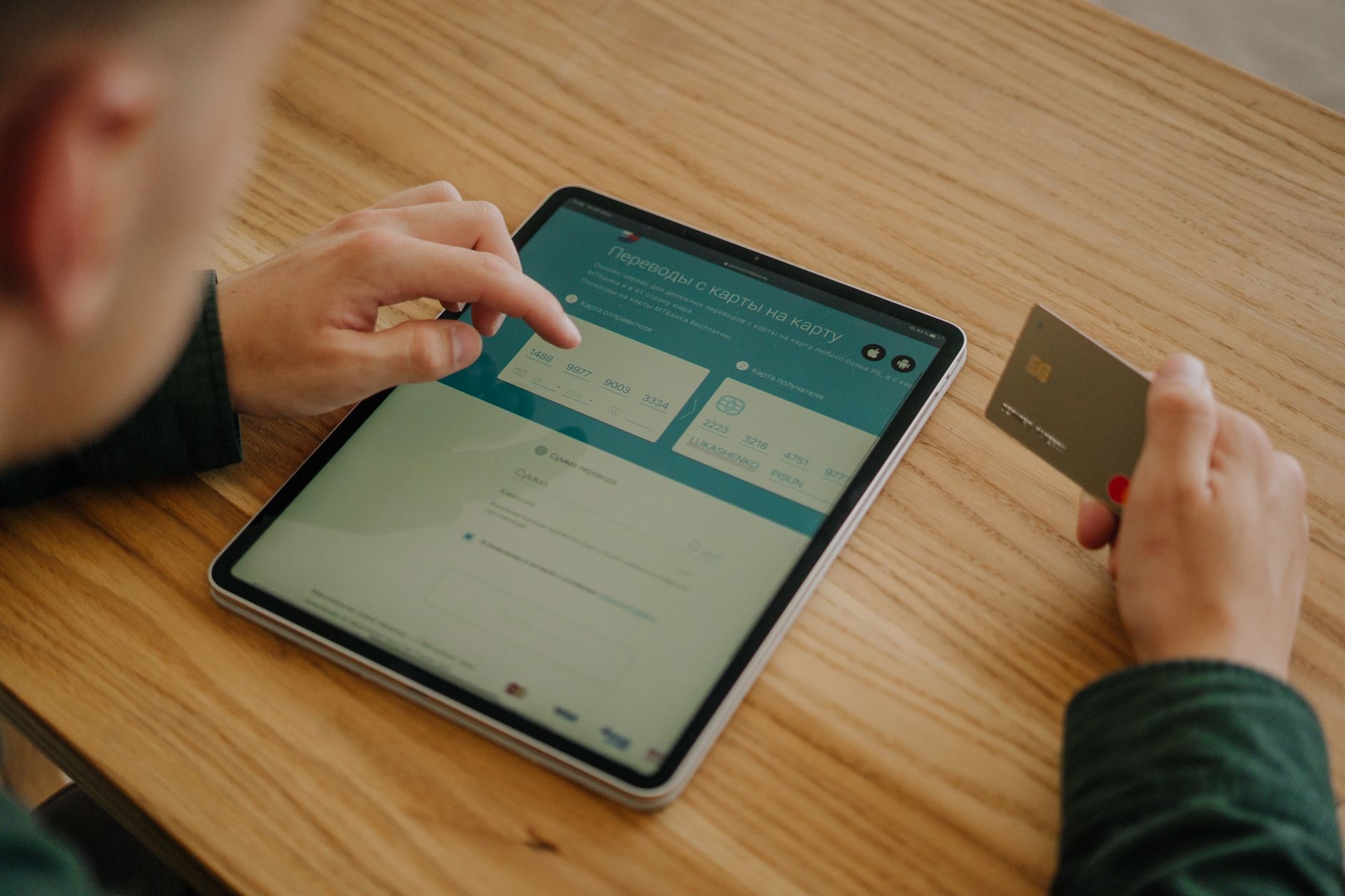 Person using an iPad with apps open