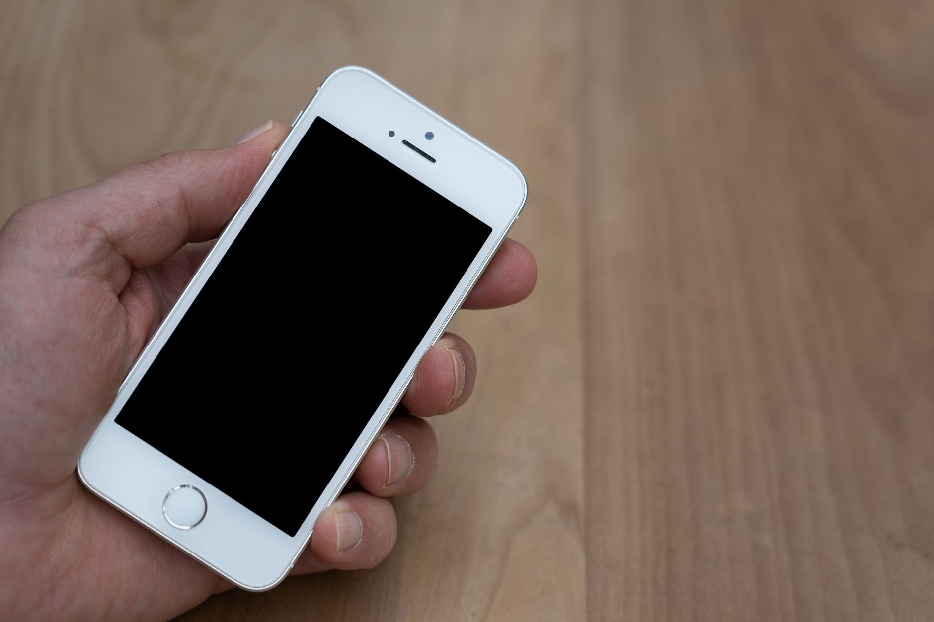 Person holding a smartphone closeup