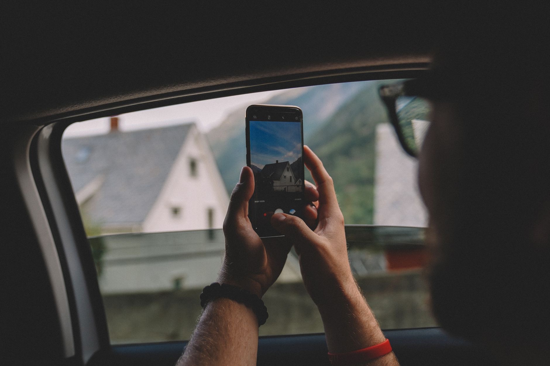 A person taking a photo with a smartphone