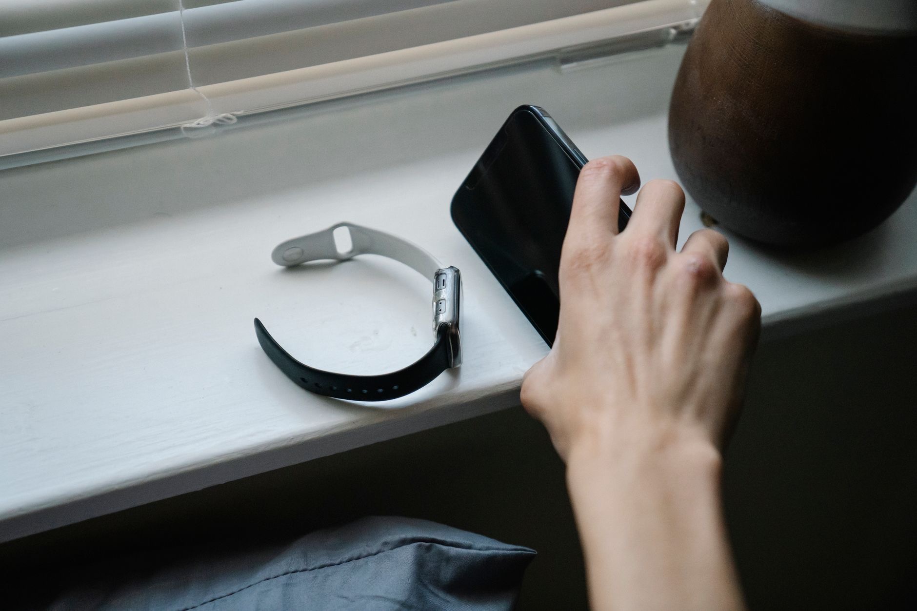 A person checking notifications on a phone