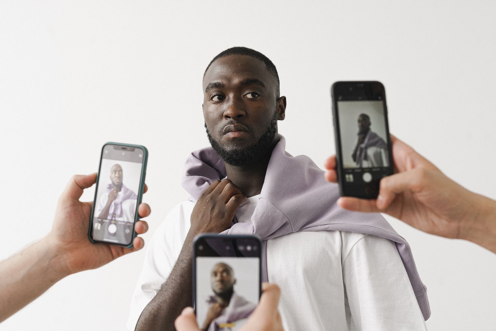 A person browsing photos on a smartphone