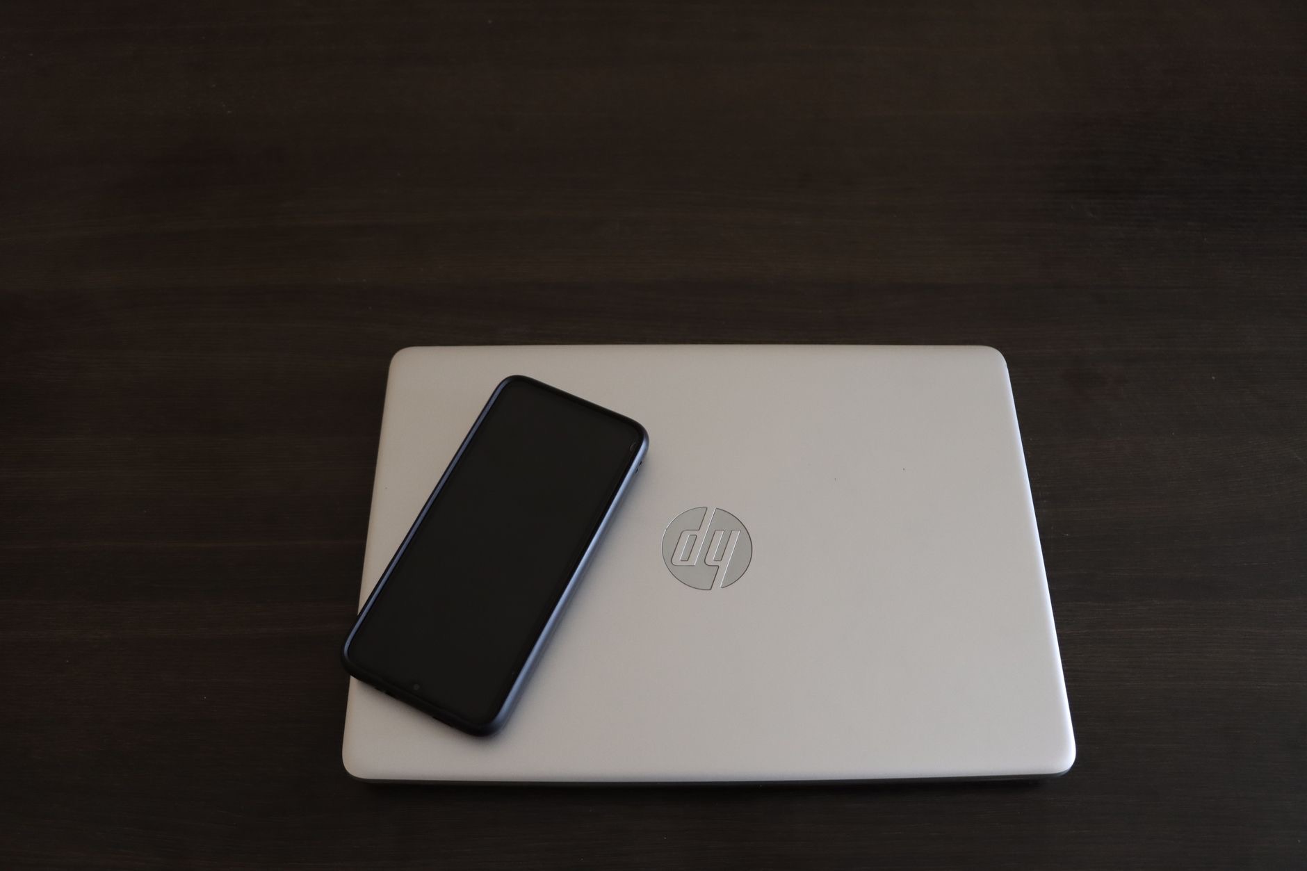 A smartphone connected to a computer