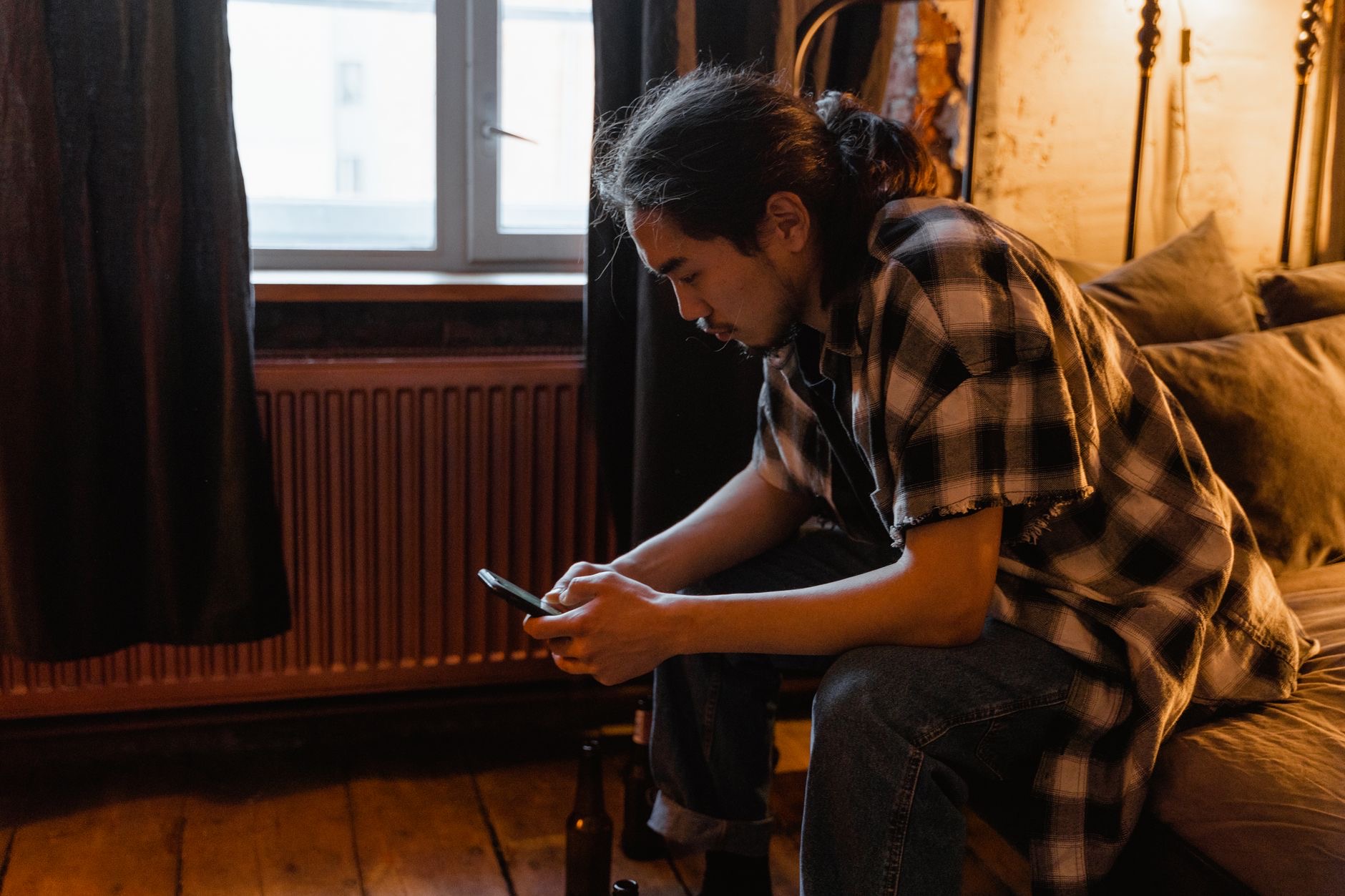 A person using a smartphone at home