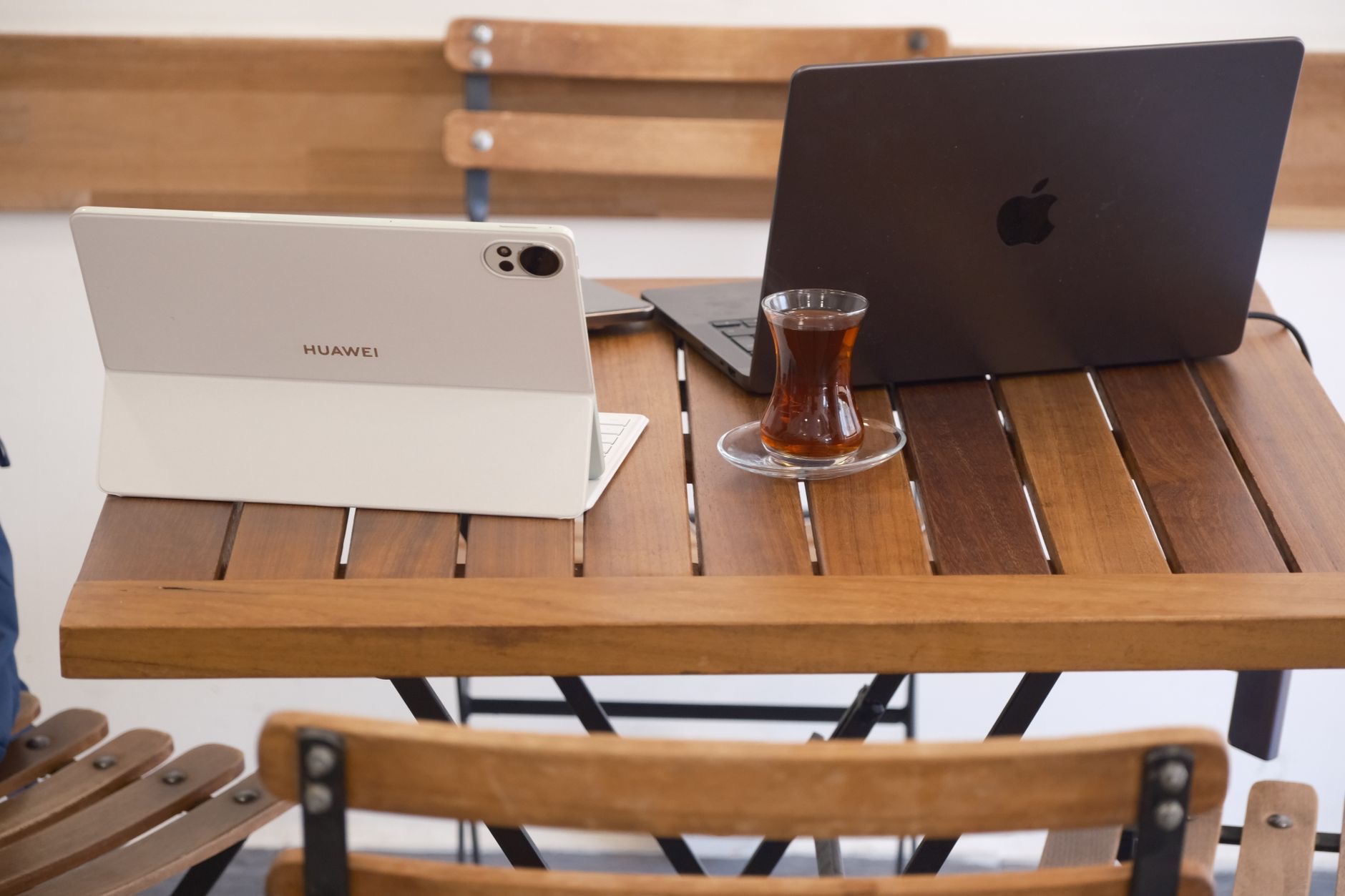 A MacBook Air on a cafe table