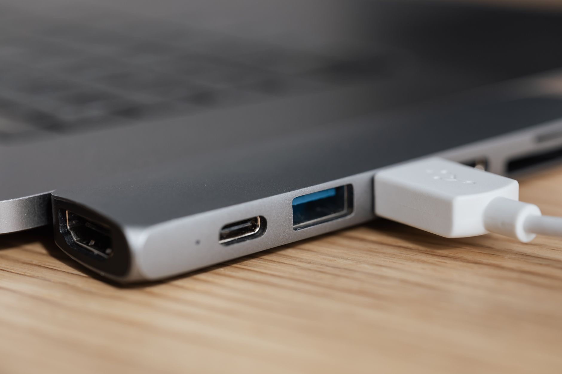 A laptop power adapter and cable