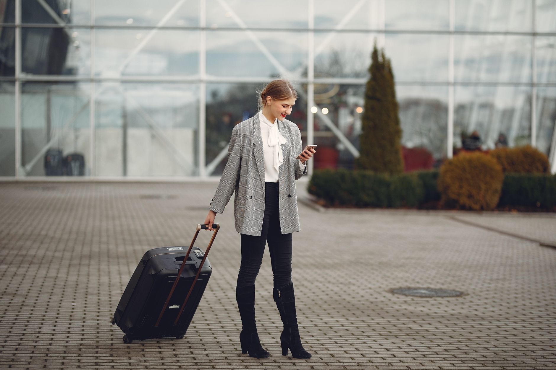 Traveler using a phone on a journey