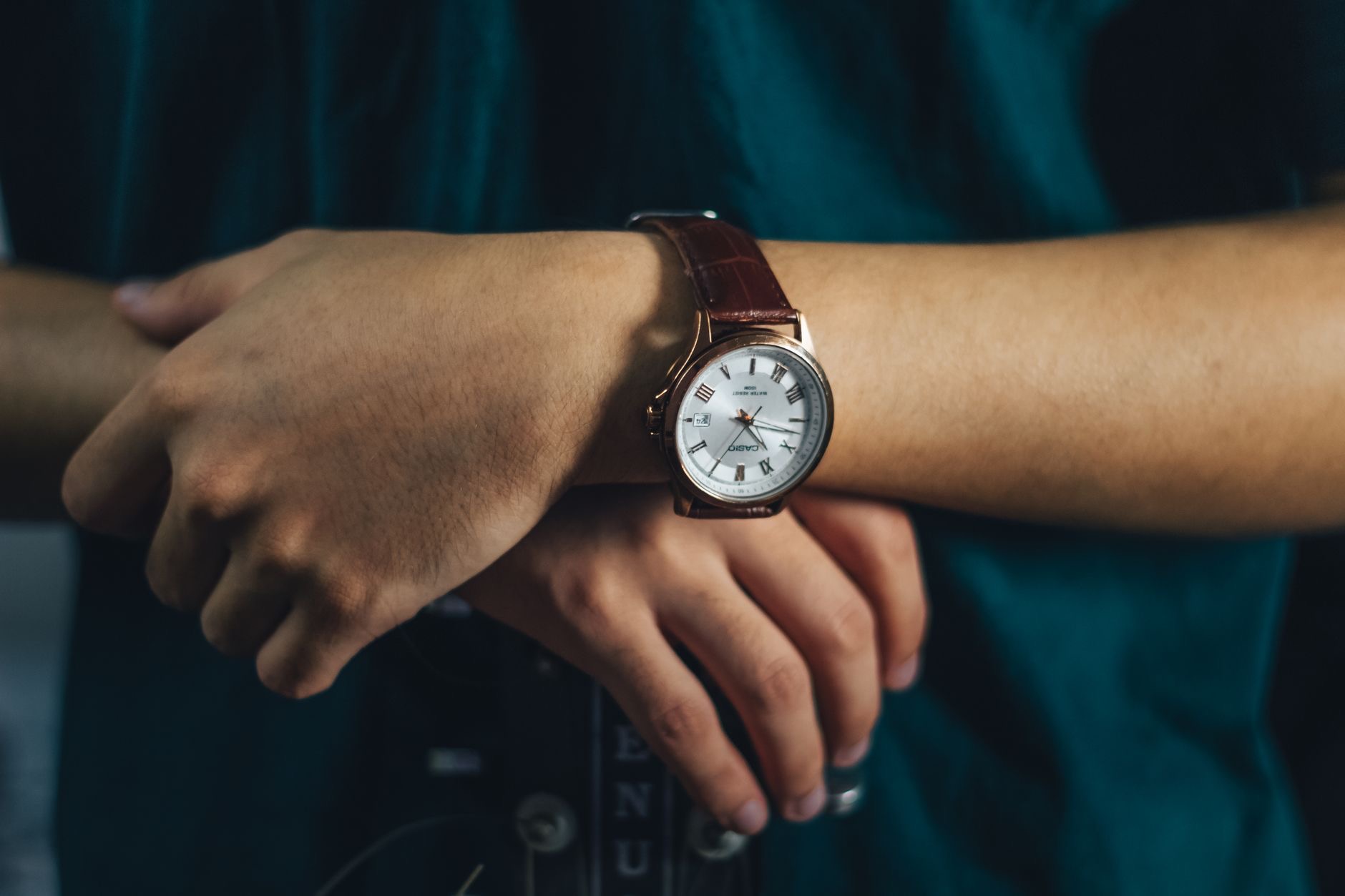 Person changing an Apple Watch band