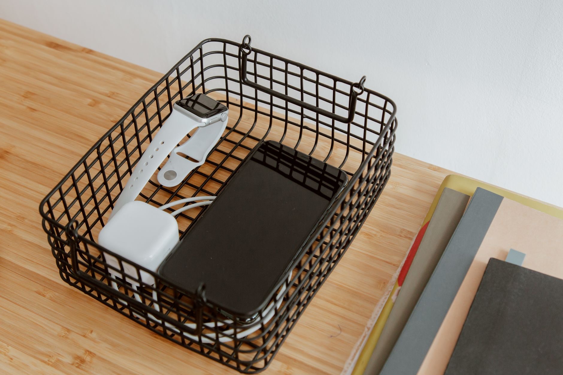 Devices charging neatly on a desk