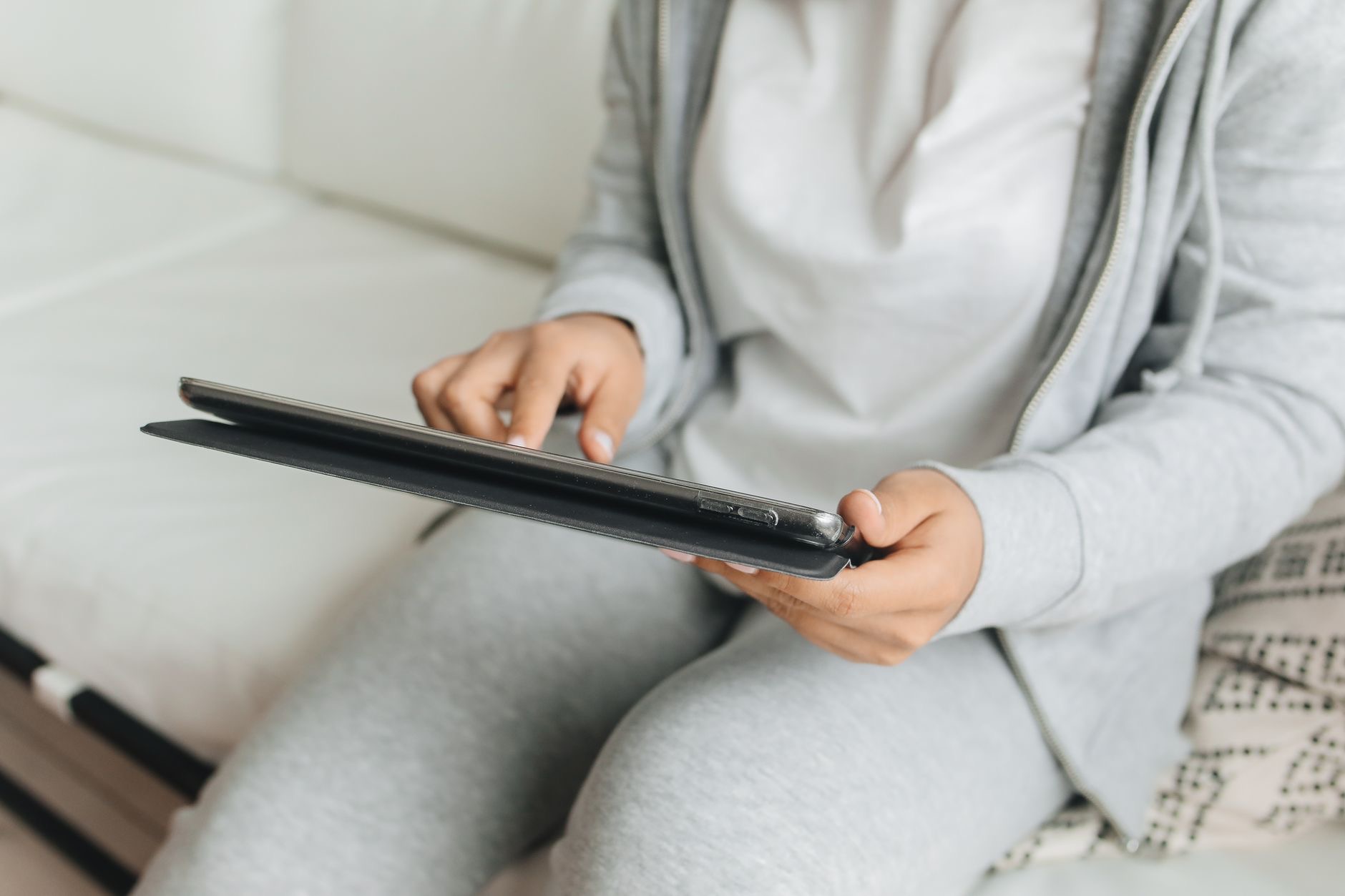A person using an iPad for the first time