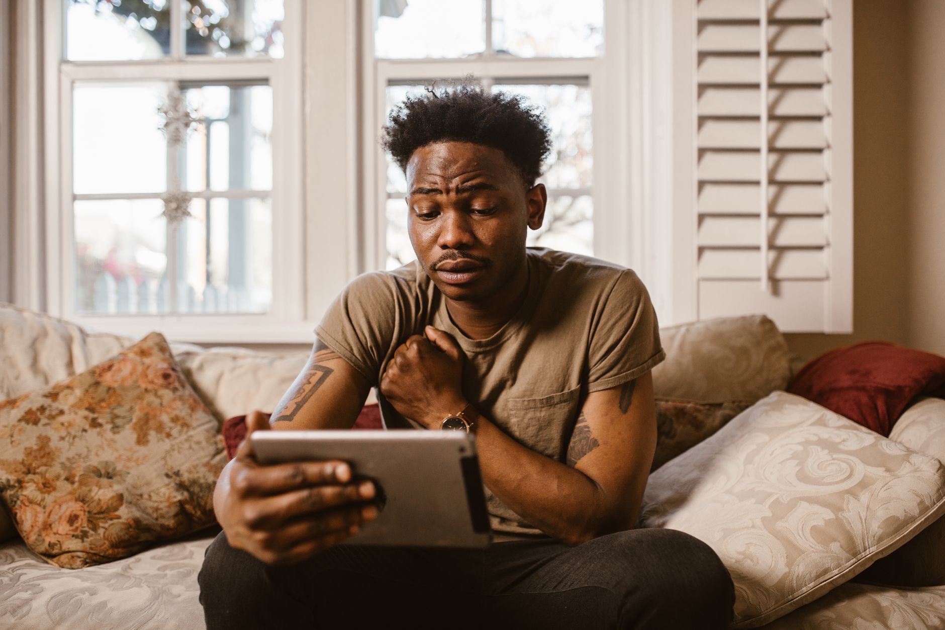 Person watching a movie on an iPad
