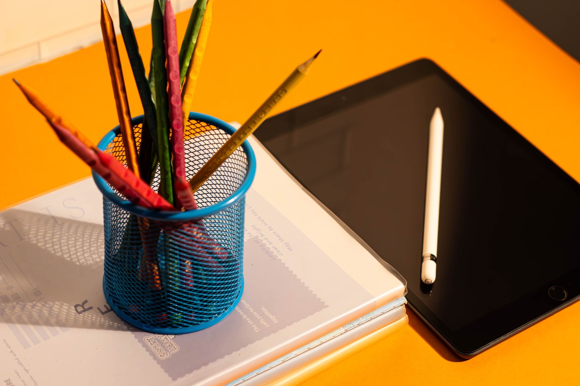 iPad with an Apple Pencil on a desk