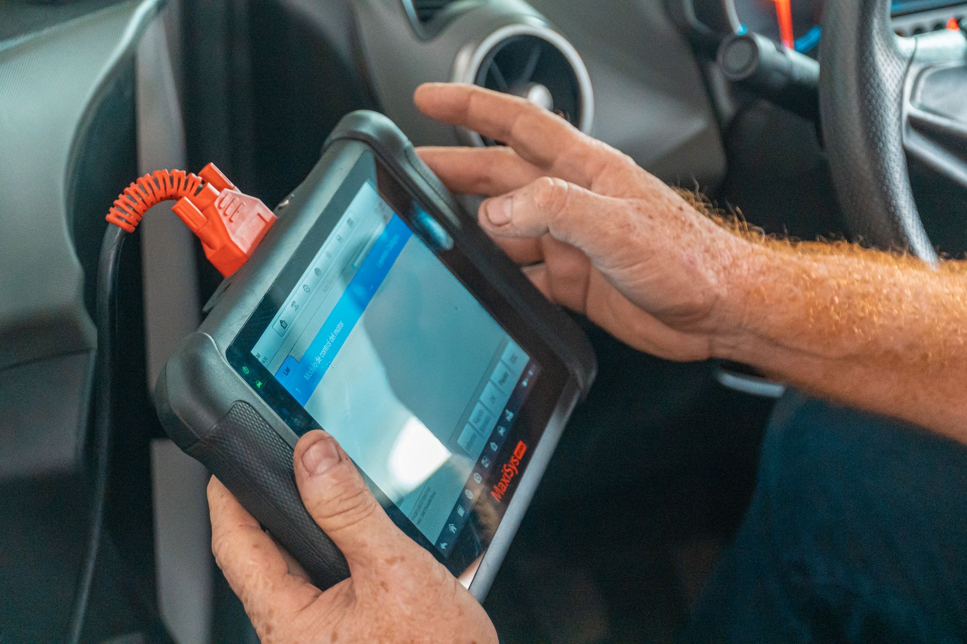 A tablet screen under inspection