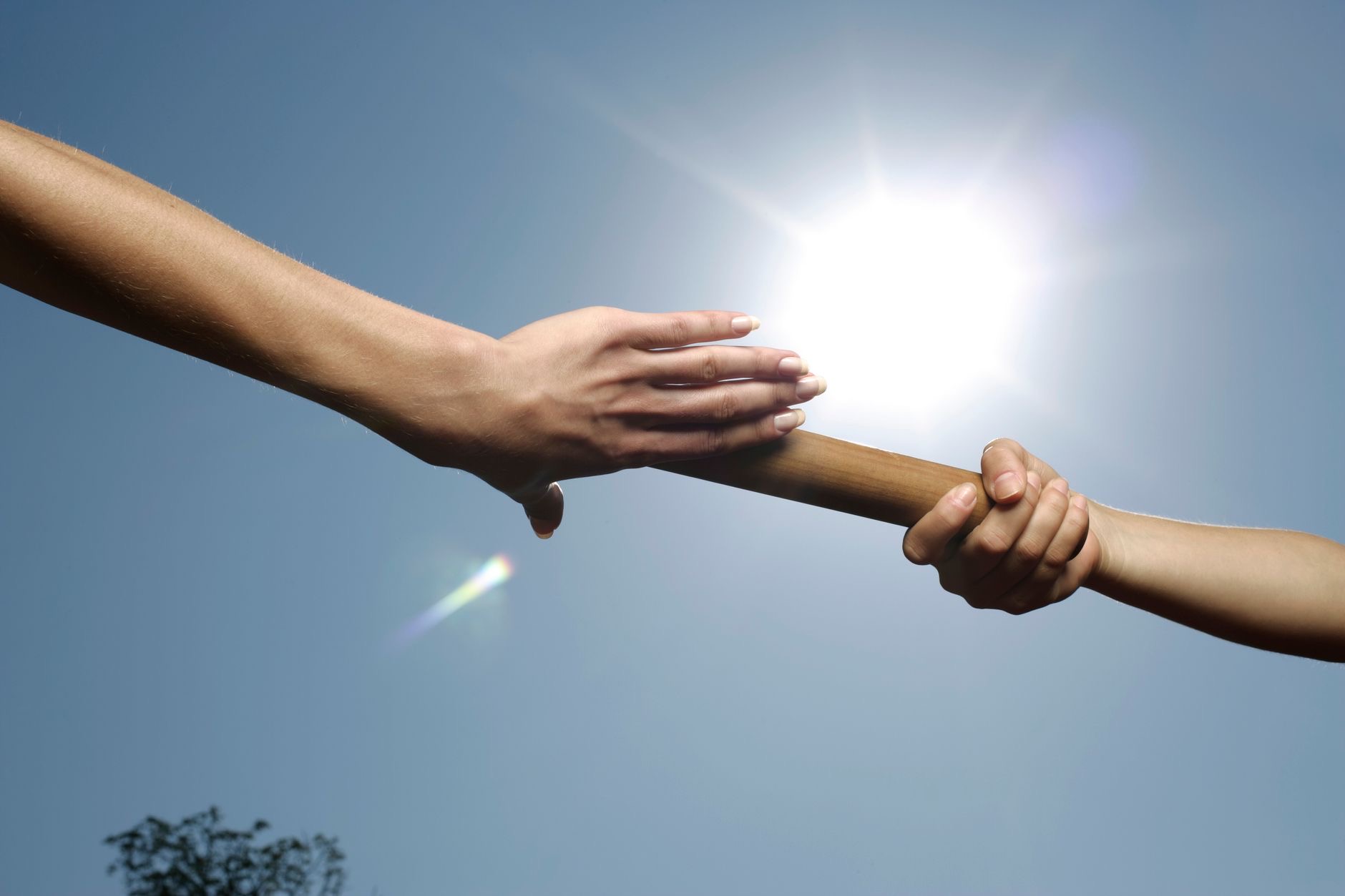 A tablet changing hands