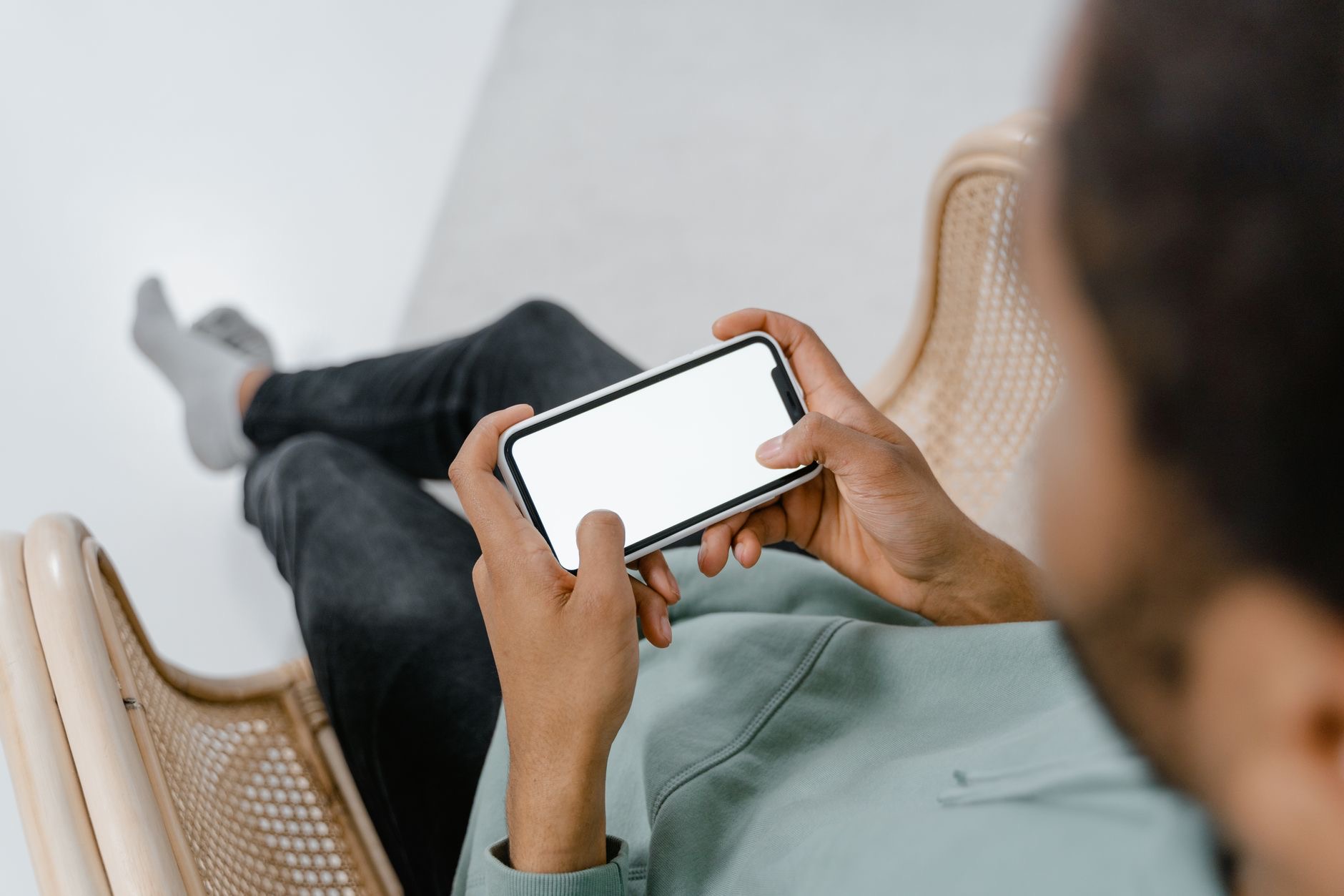 Someone using an iPhone daily