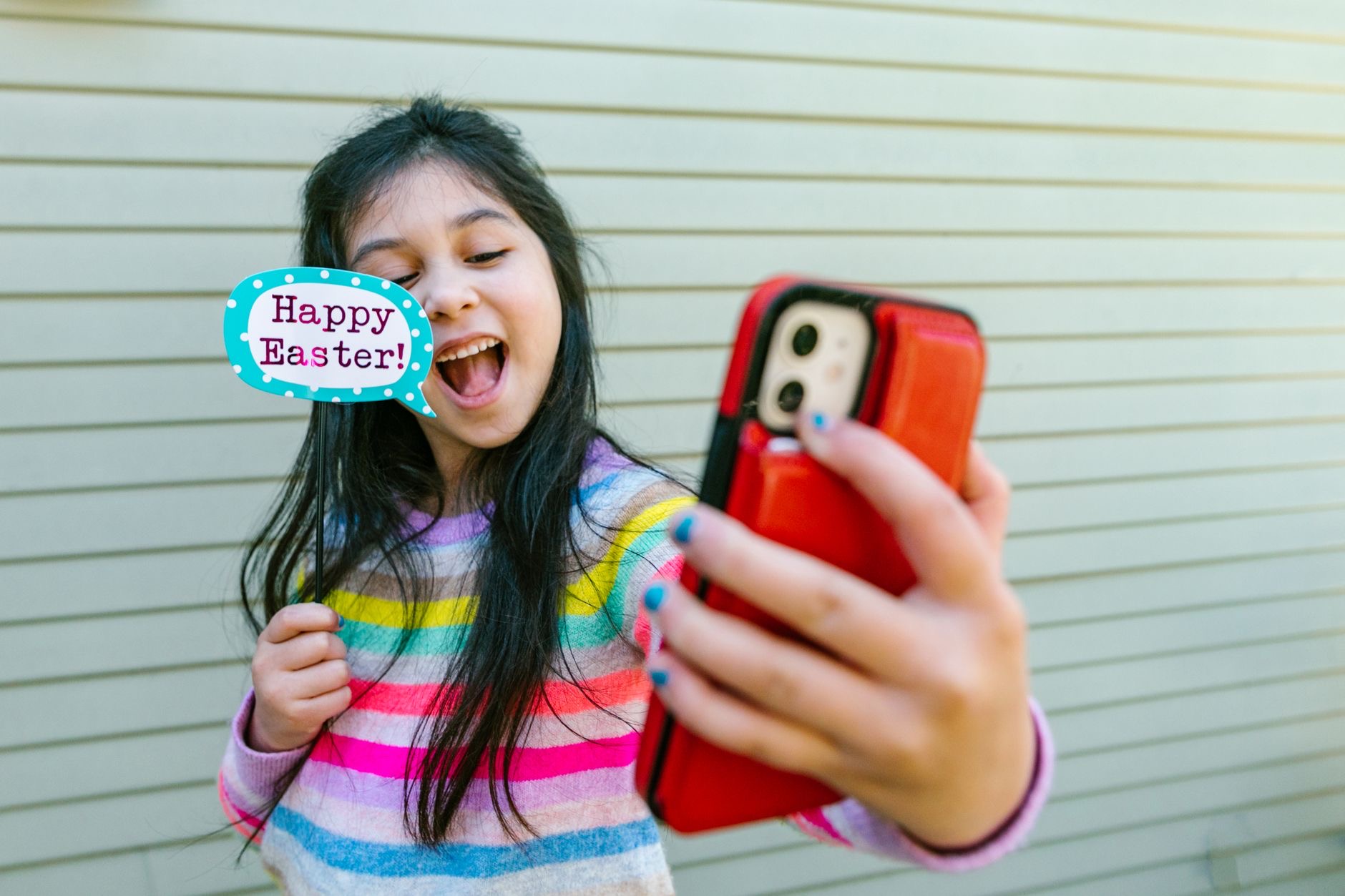 A protected phone in small hands