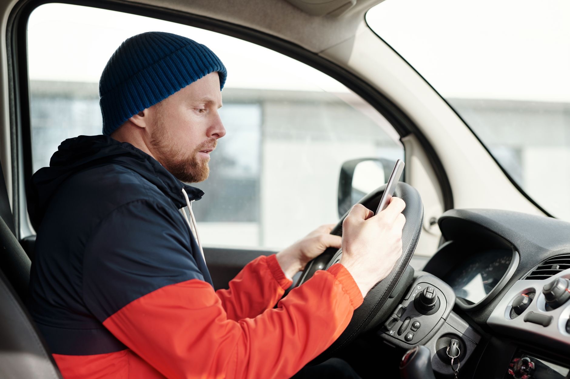 A phone set aside while driving