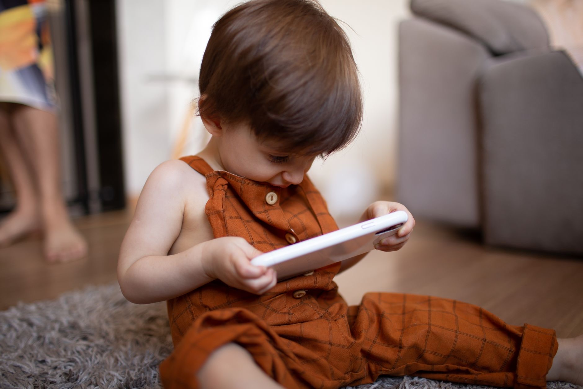 A child using a tablet with limits
