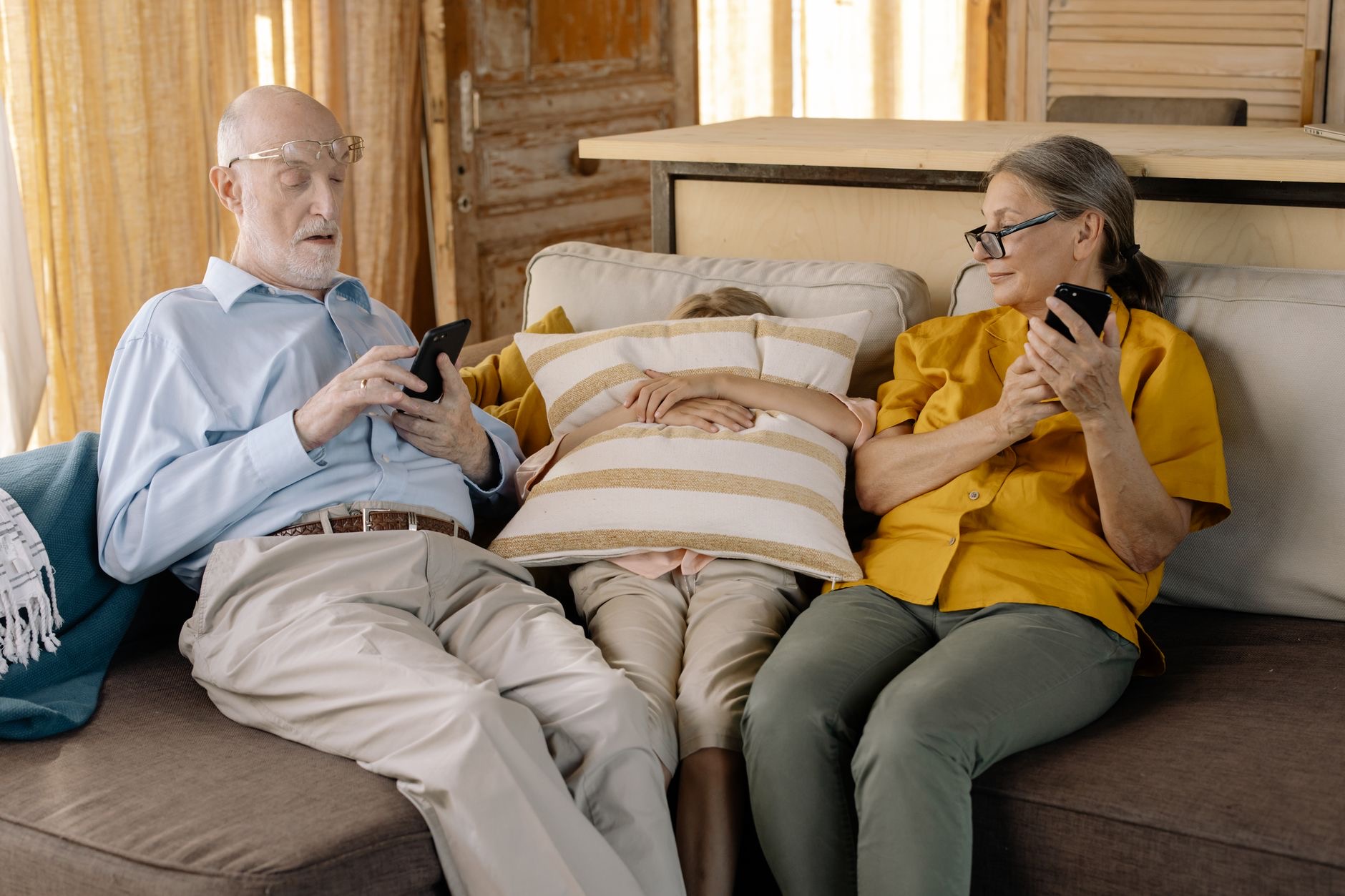 A family staying connected with phones