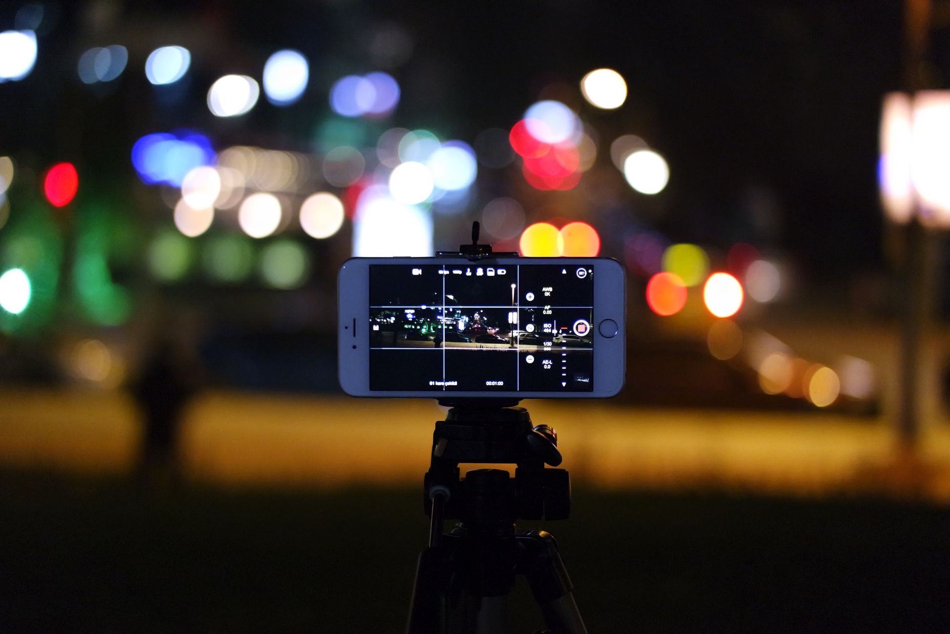 A phone steady on a tripod at night