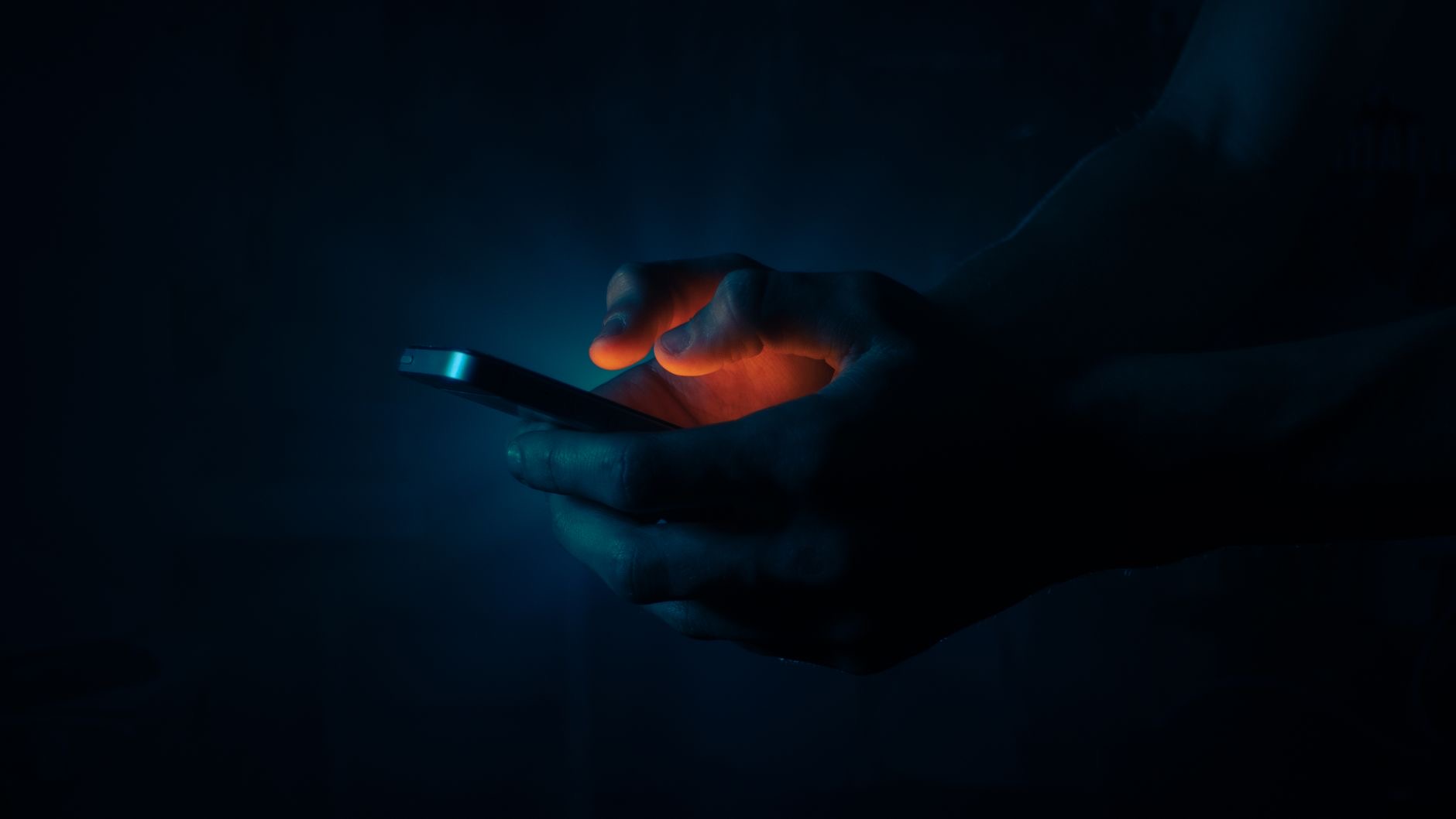 Someone using their phone calmly