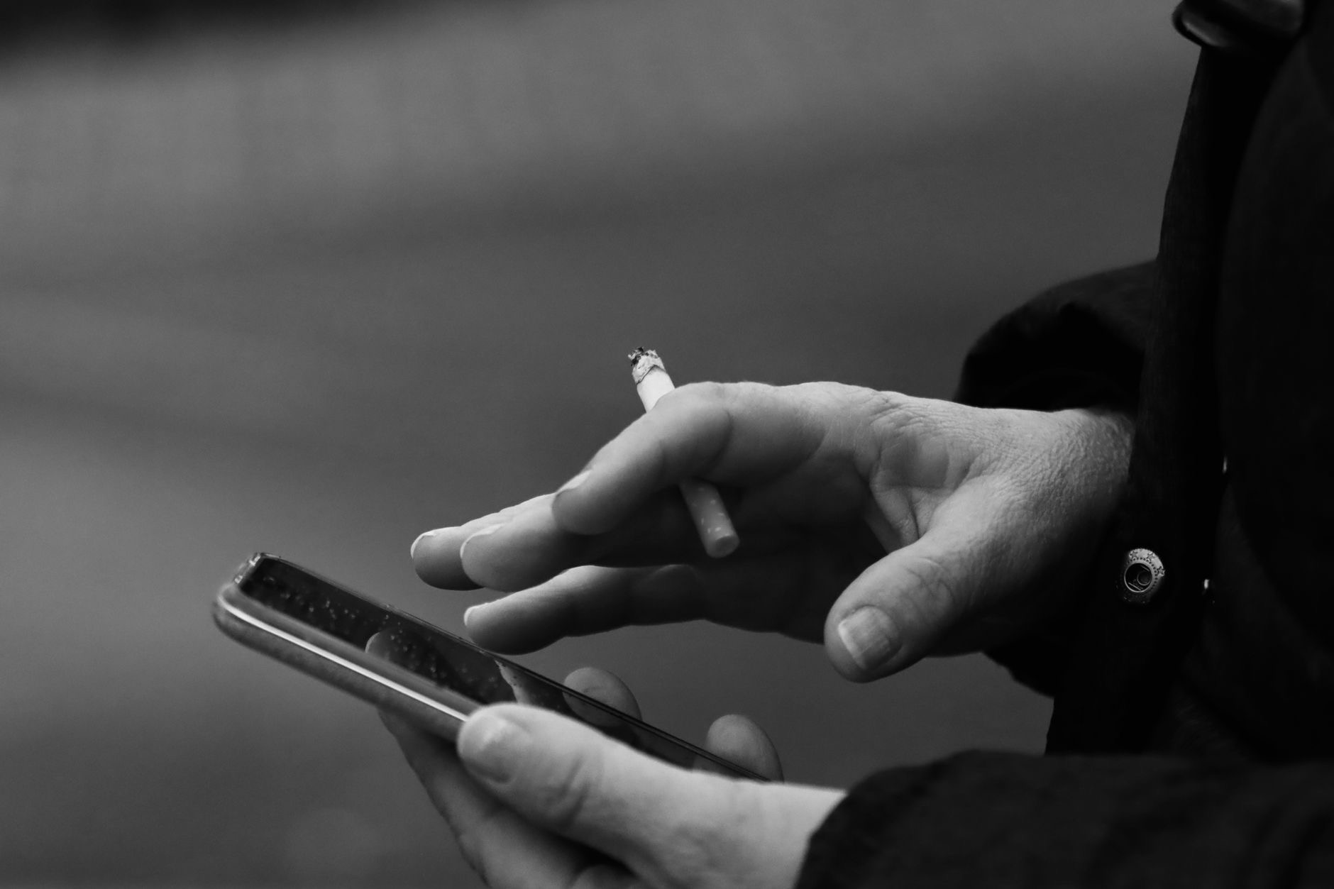 Someone using their phone on the go