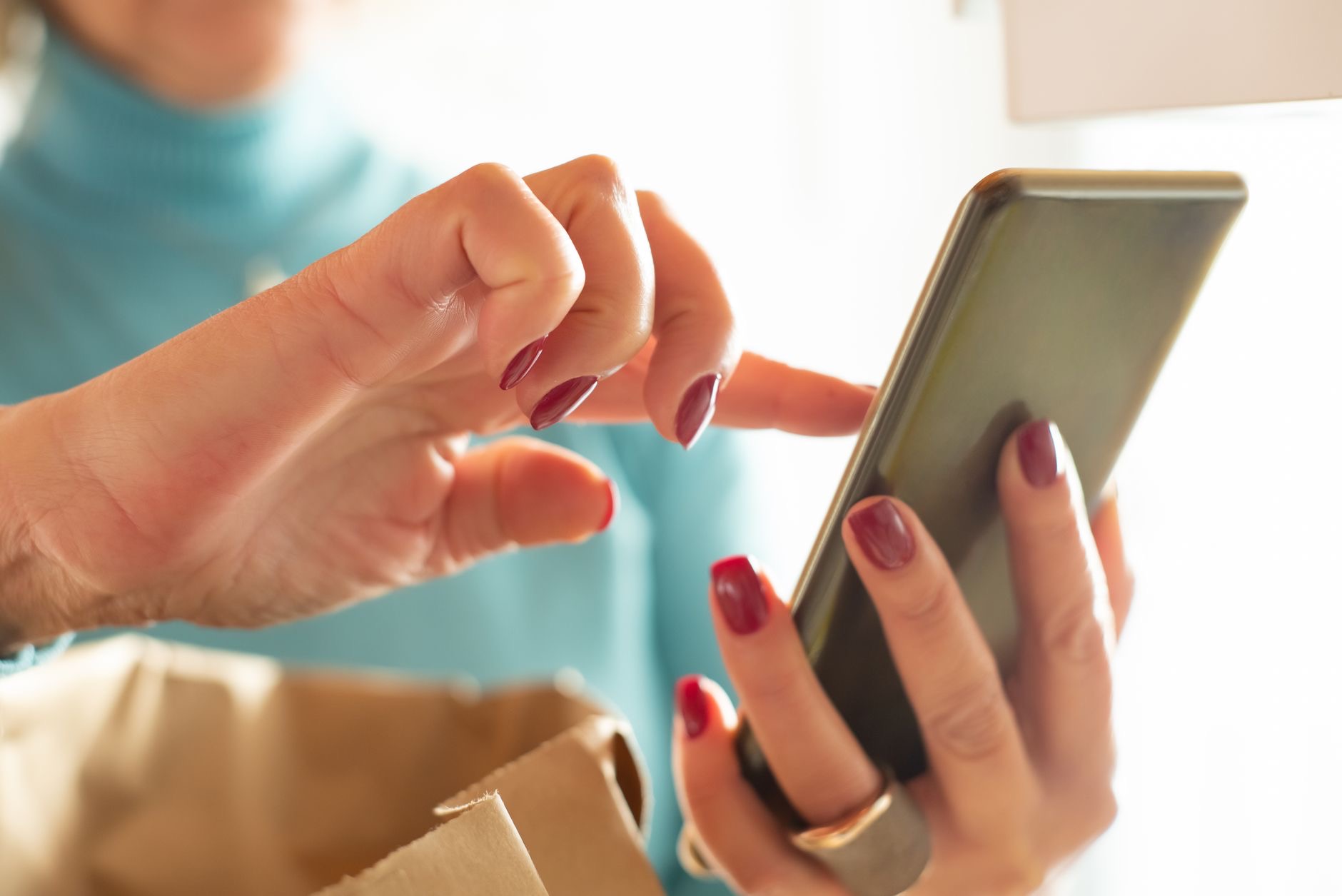 Someone reading a label with a phone