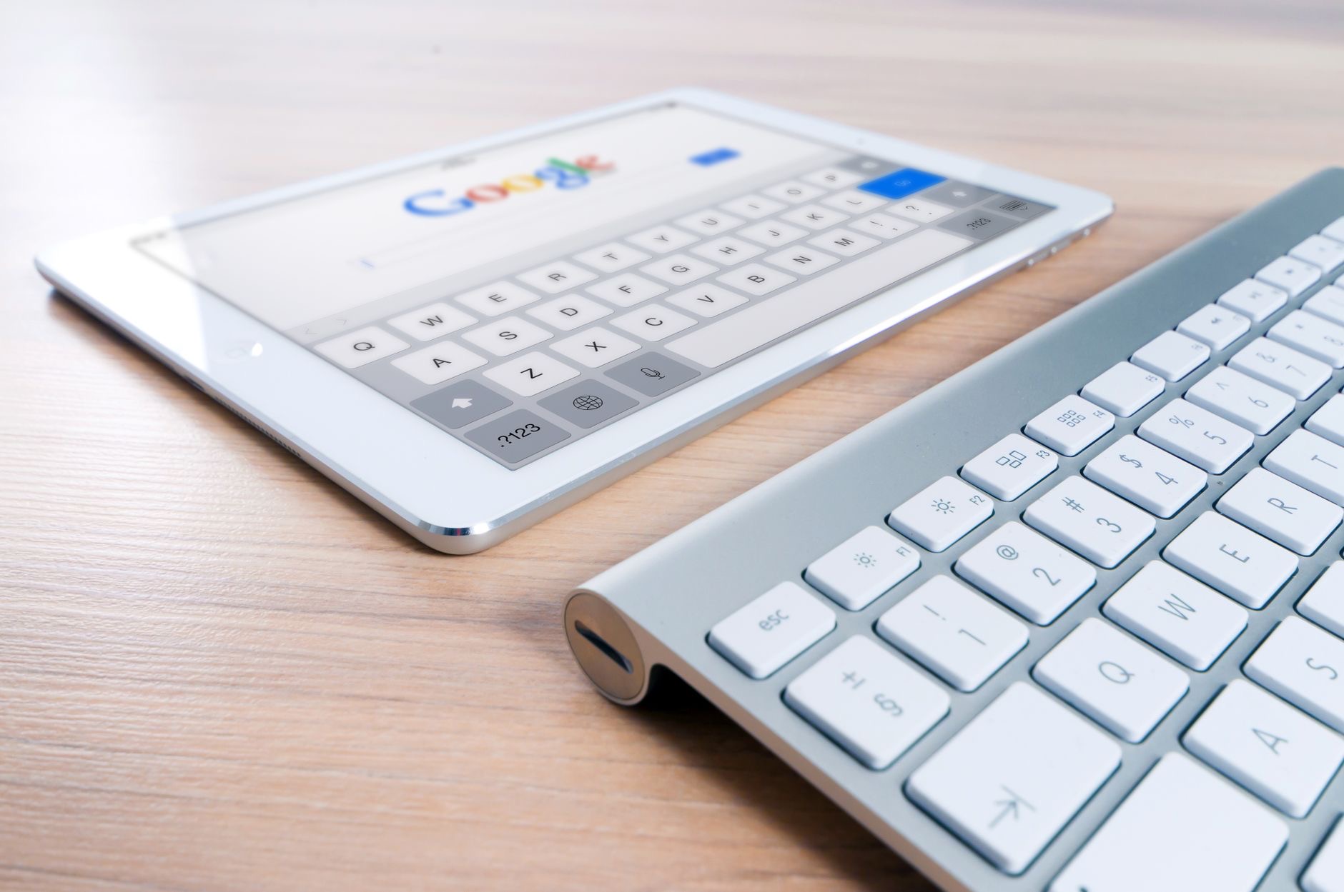 iPad on a desk with a keyboard