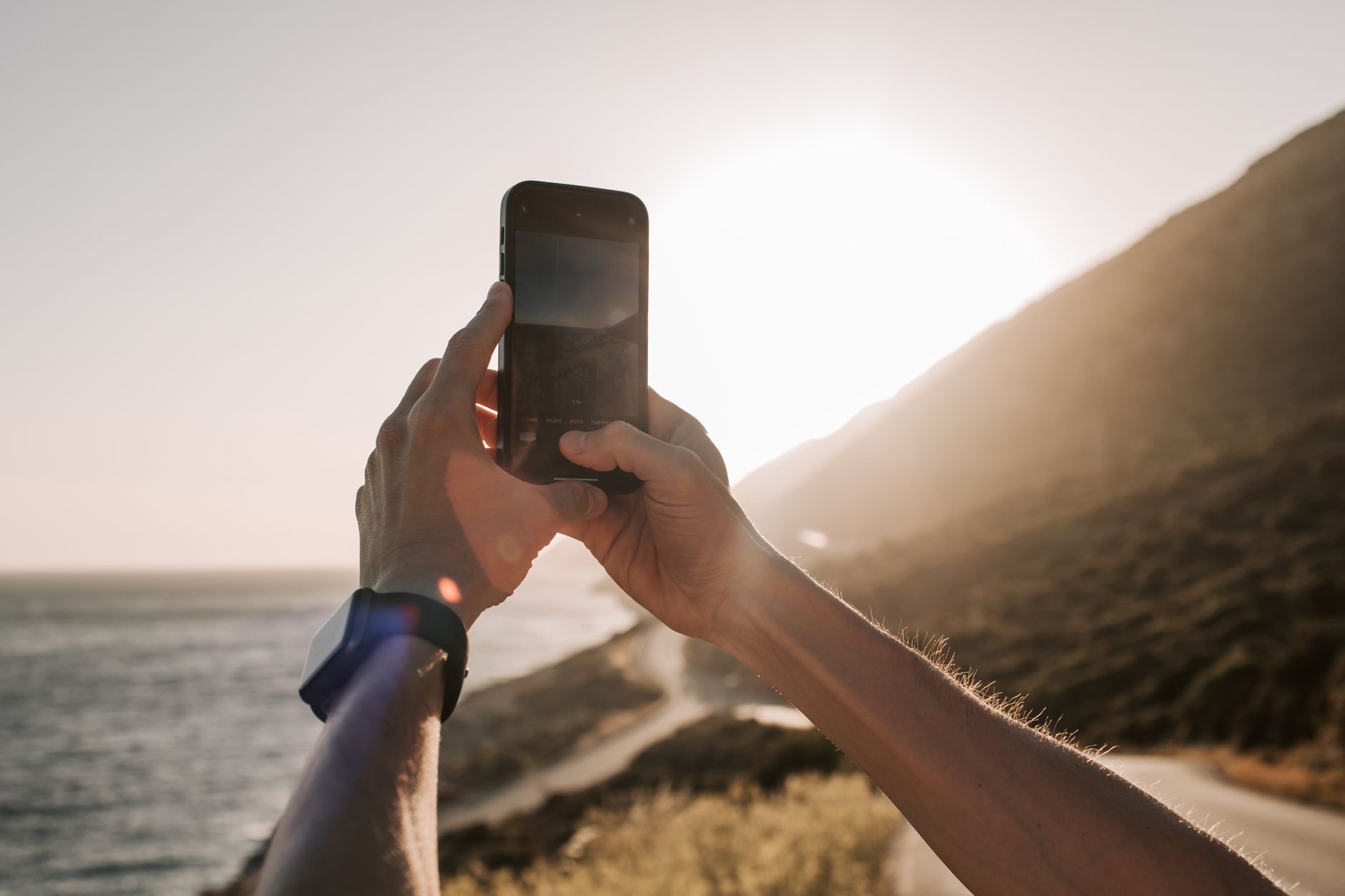 Person taking a photo with an iPhone
