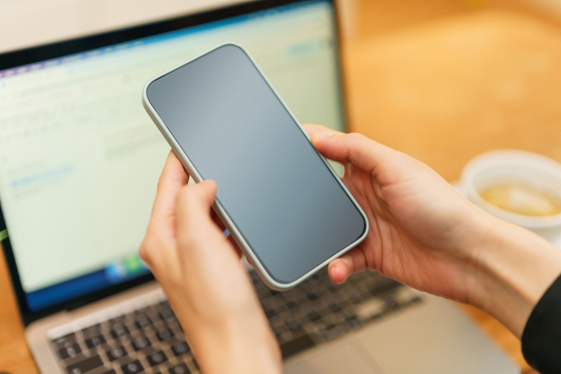 A laptop connecting to a phone