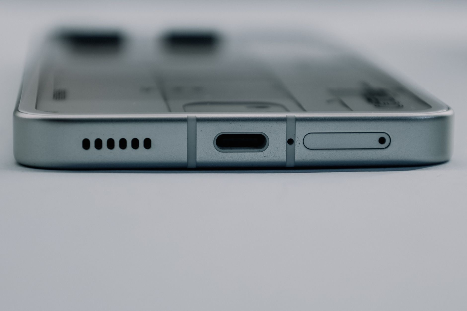 Close-up of a phone microphone area