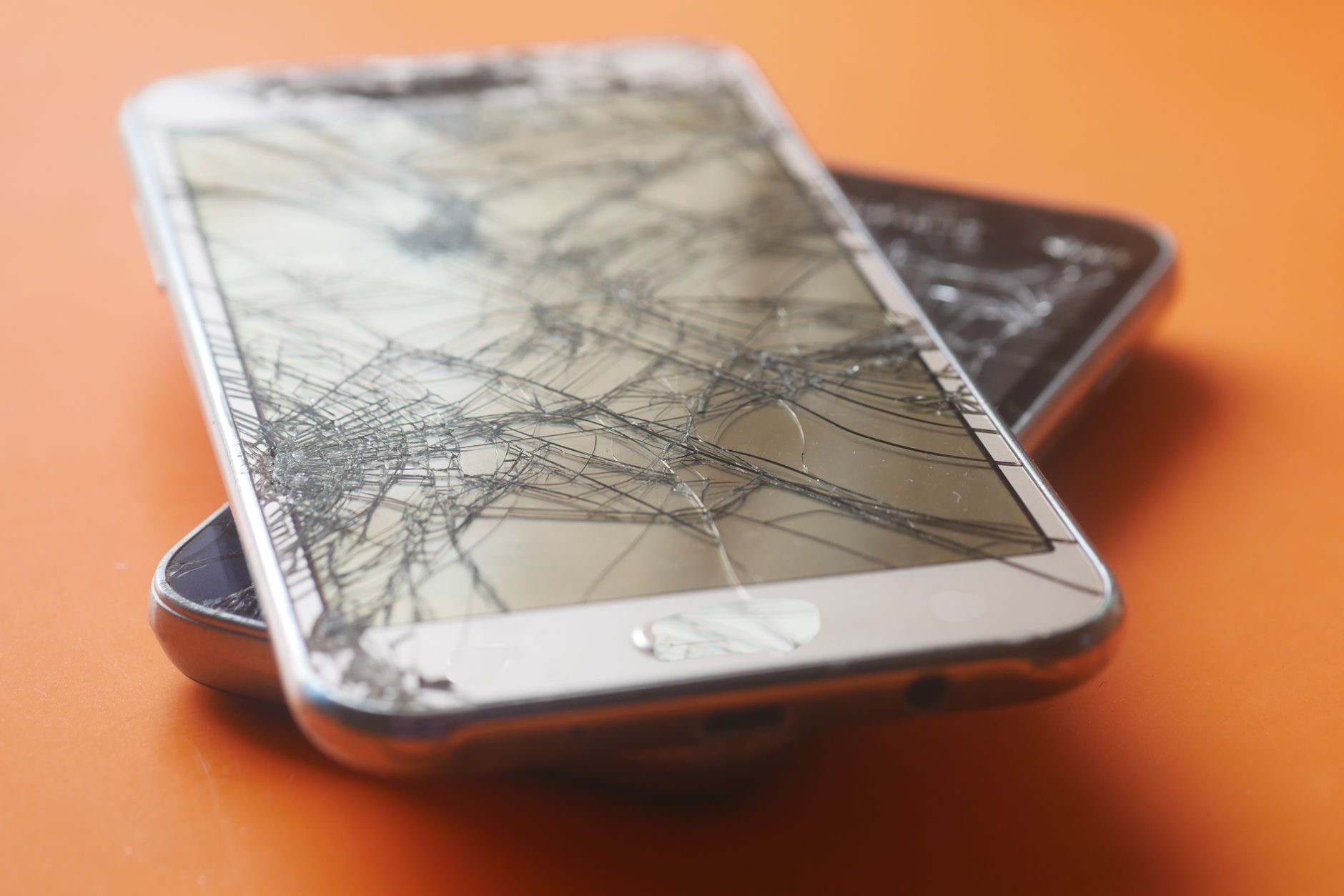 A cracked protector that saved a screen