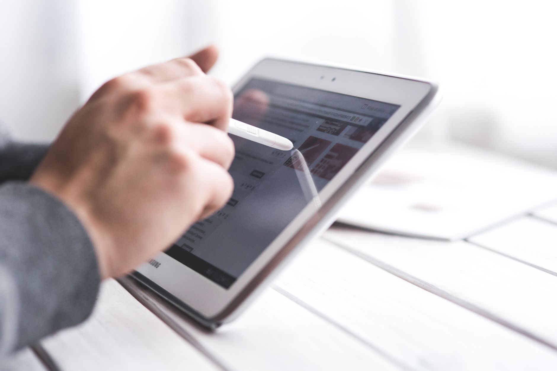 Close-up of a stylus on a tablet screen