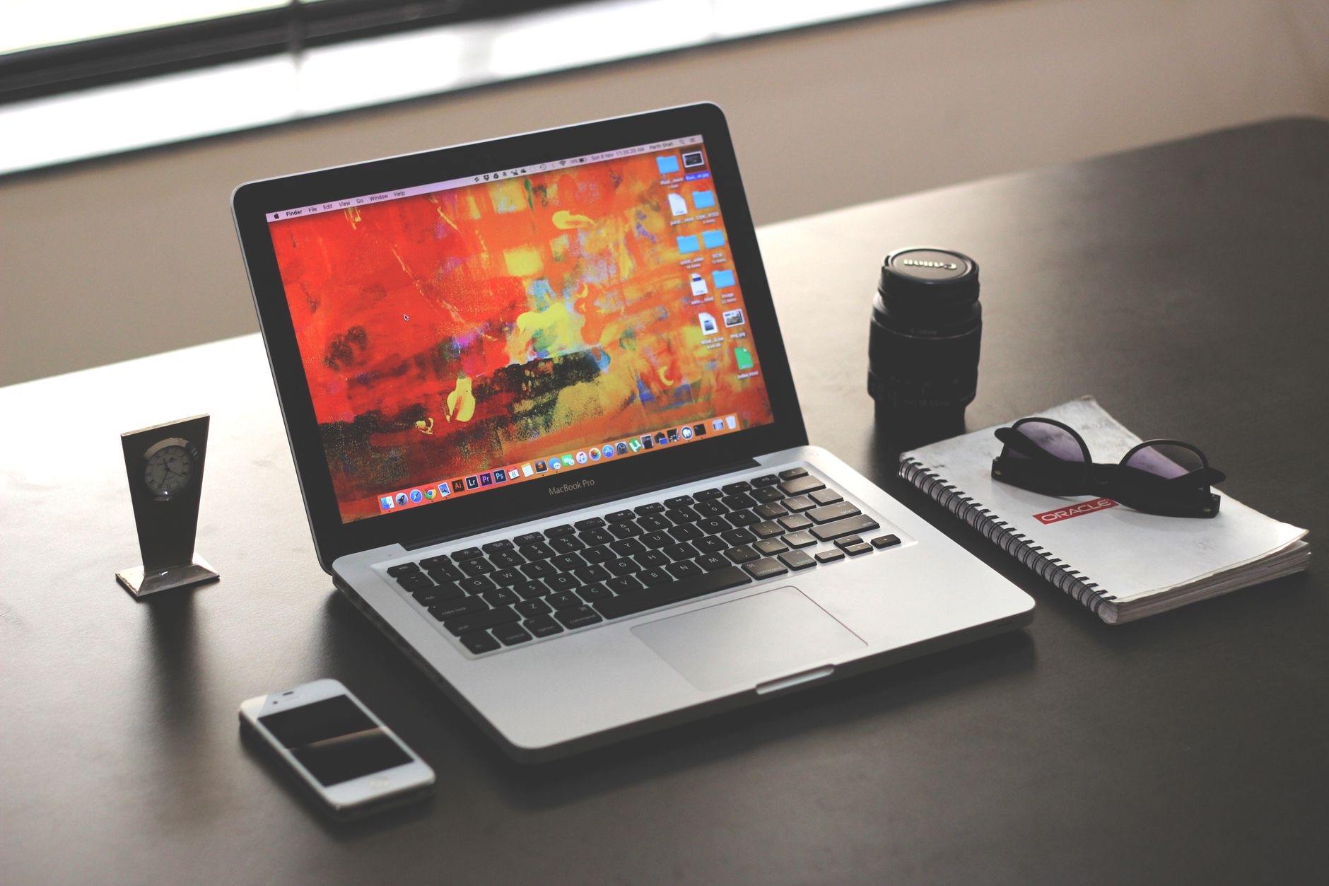 MacBook open on a clean desk